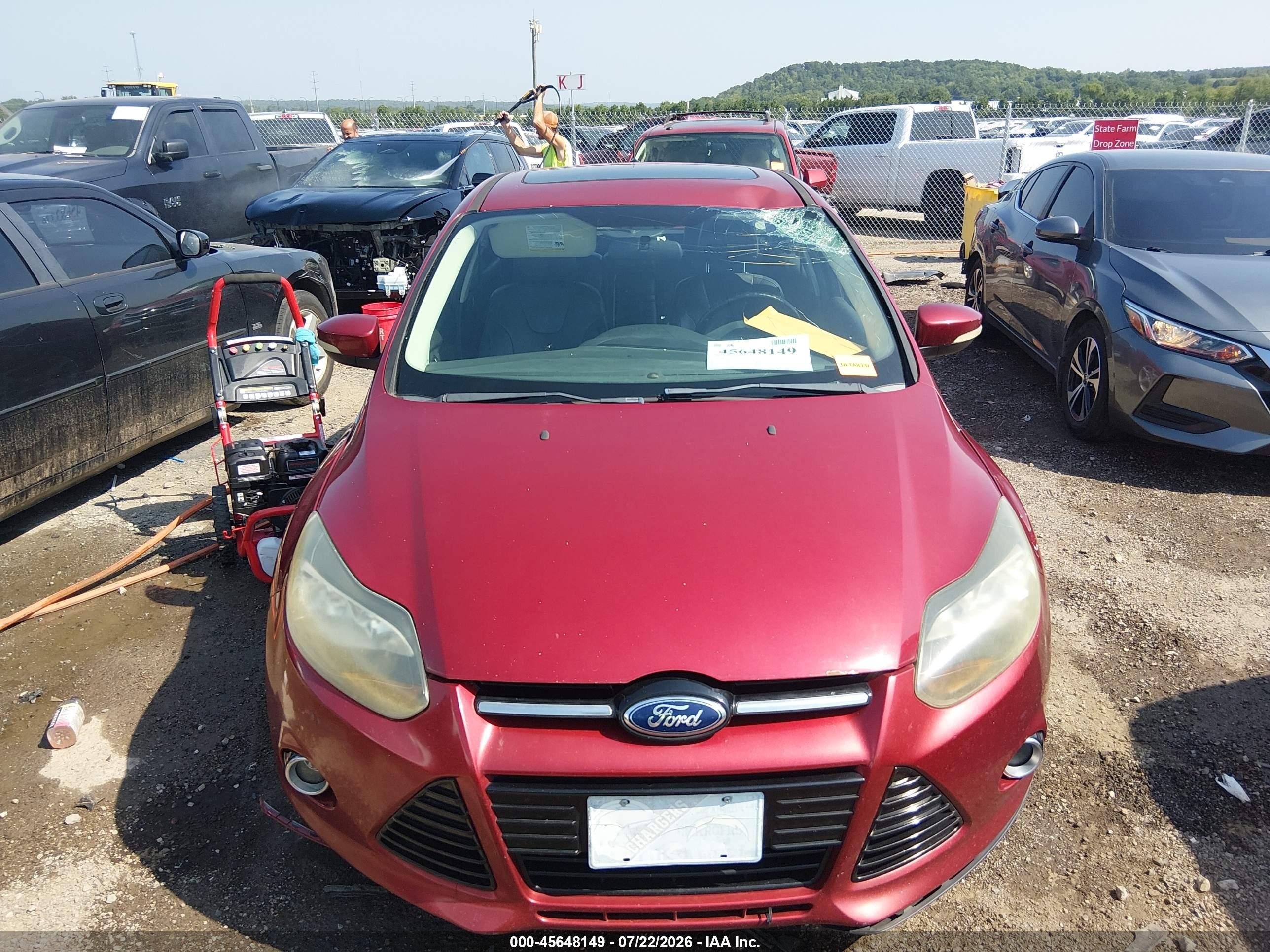 2013 Ford Focus Titanium Red vin: 1FADP3N22DL254621