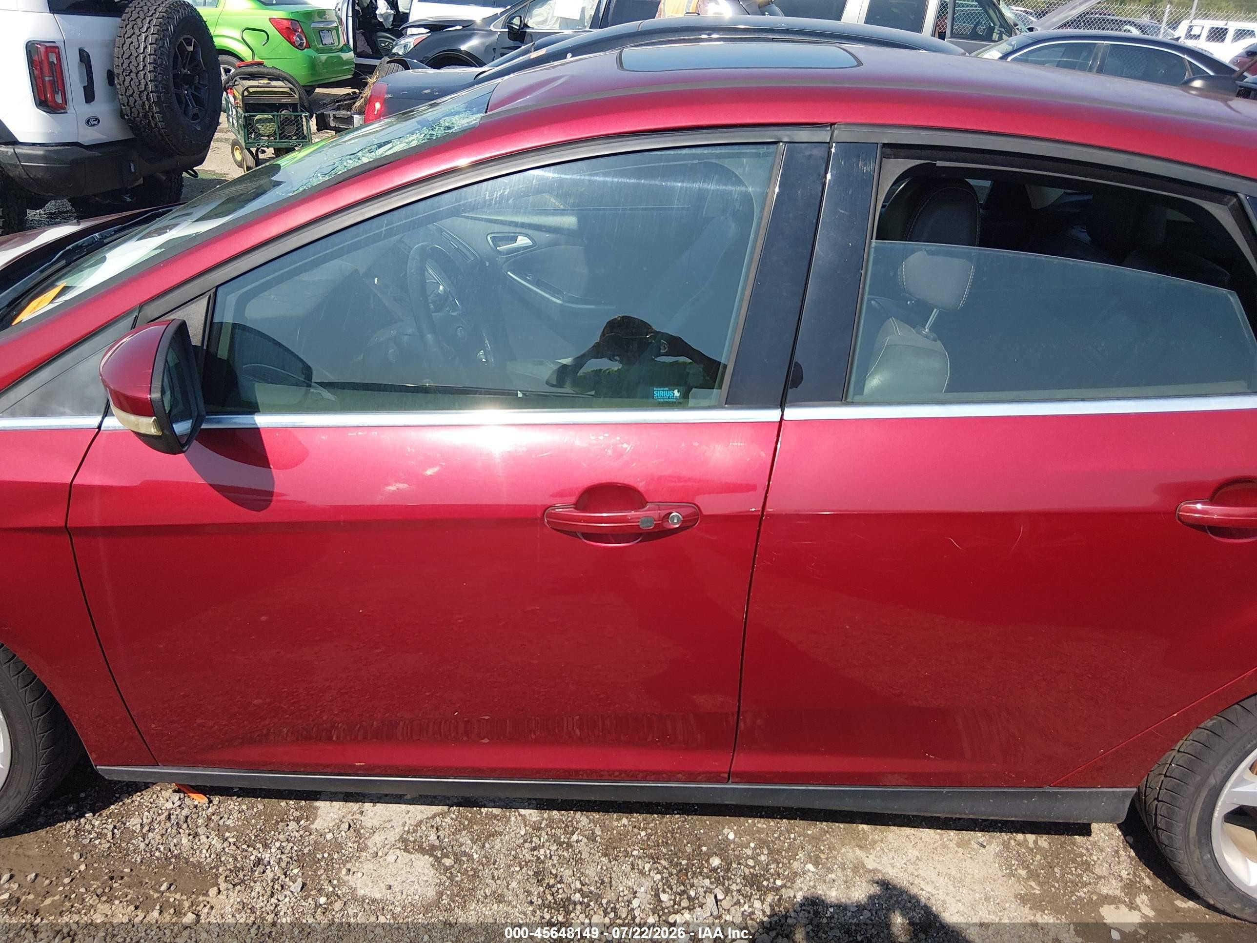 2013 Ford Focus Titanium Red vin: 1FADP3N22DL254621