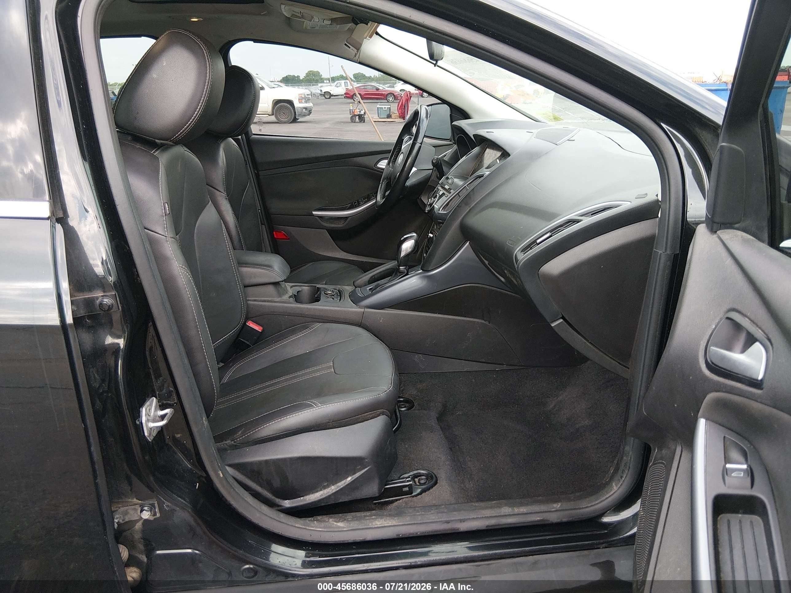 2014 Ford Focus Titanium Black vin: 1FADP3N22EL197094