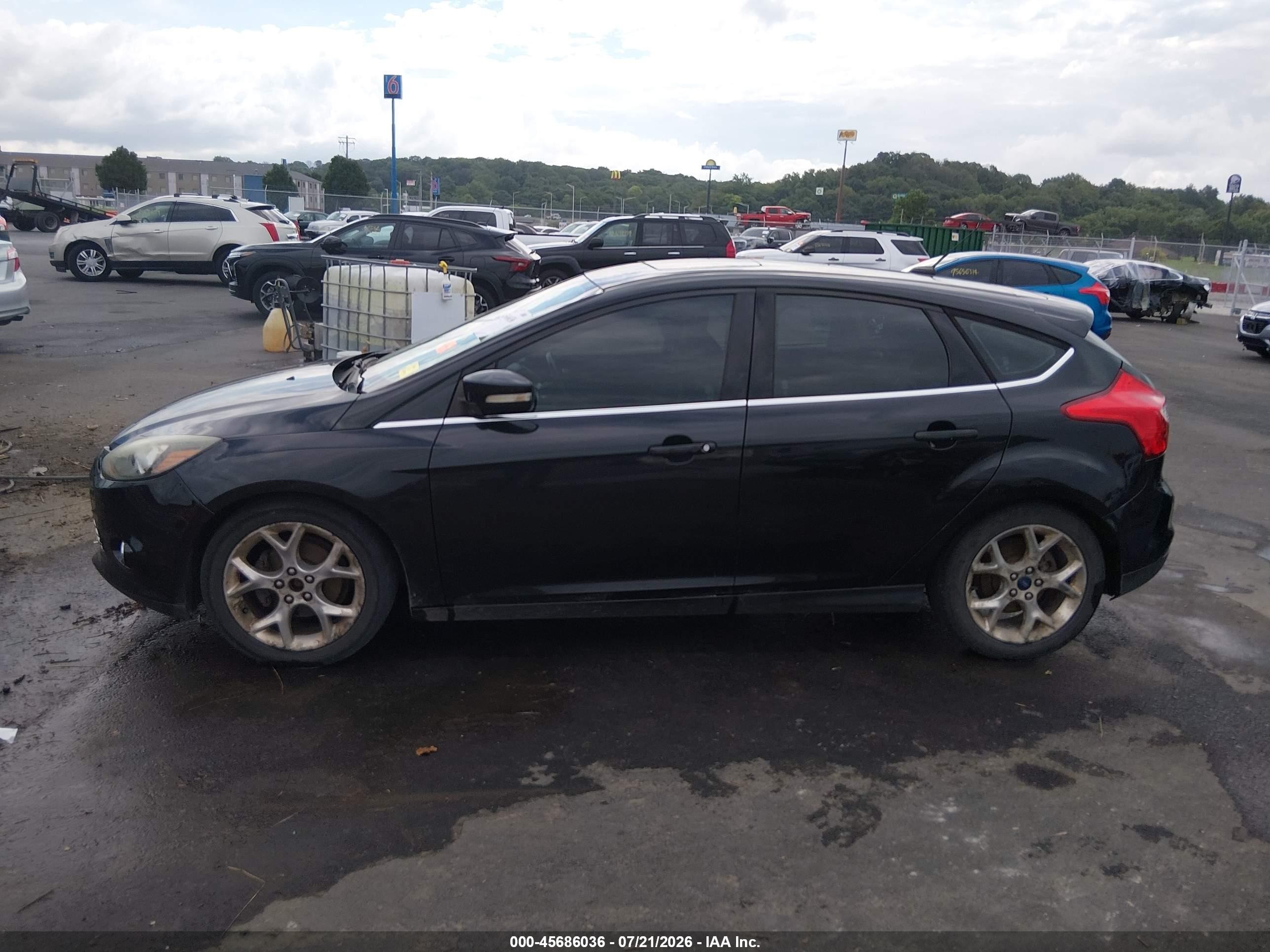 2014 Ford Focus Titanium Black vin: 1FADP3N22EL197094