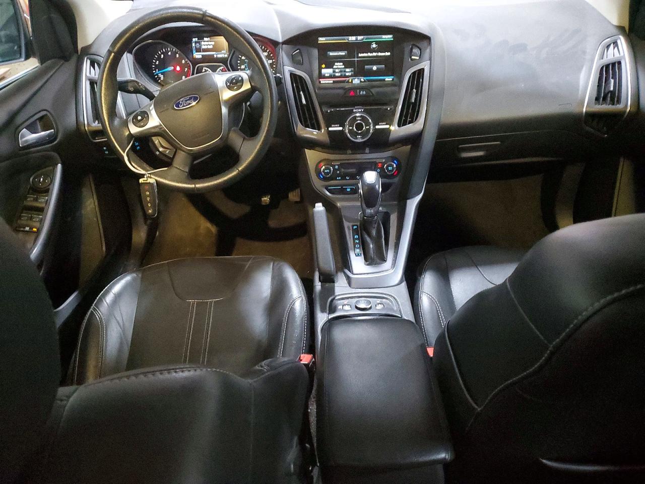 2014 Ford Focus Titanium Red vin: 1FADP3N22EL403983