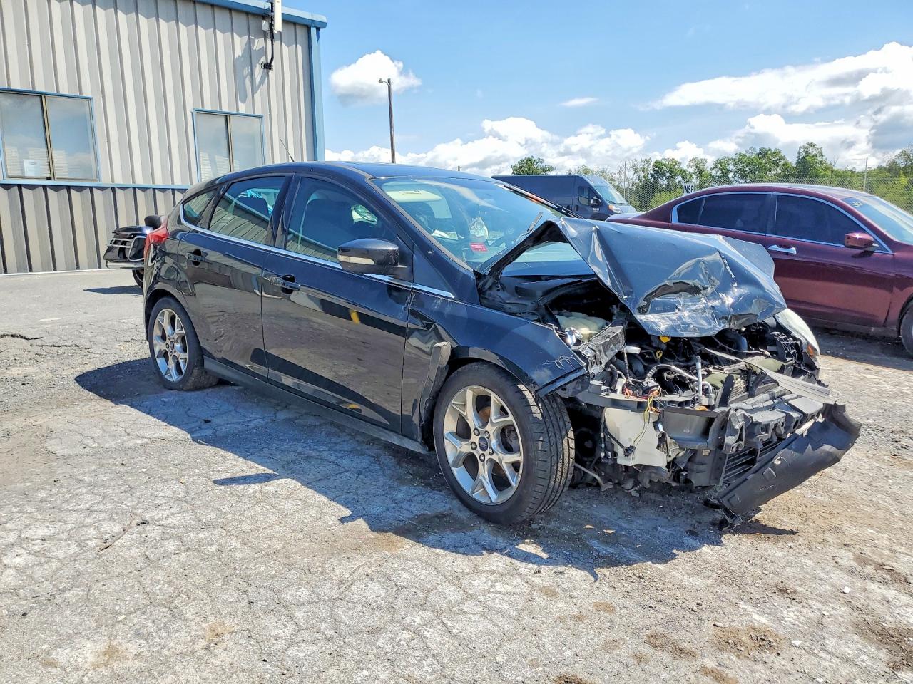 2014 Ford Focus Titanium Black vin: 1FADP3N22EL417964