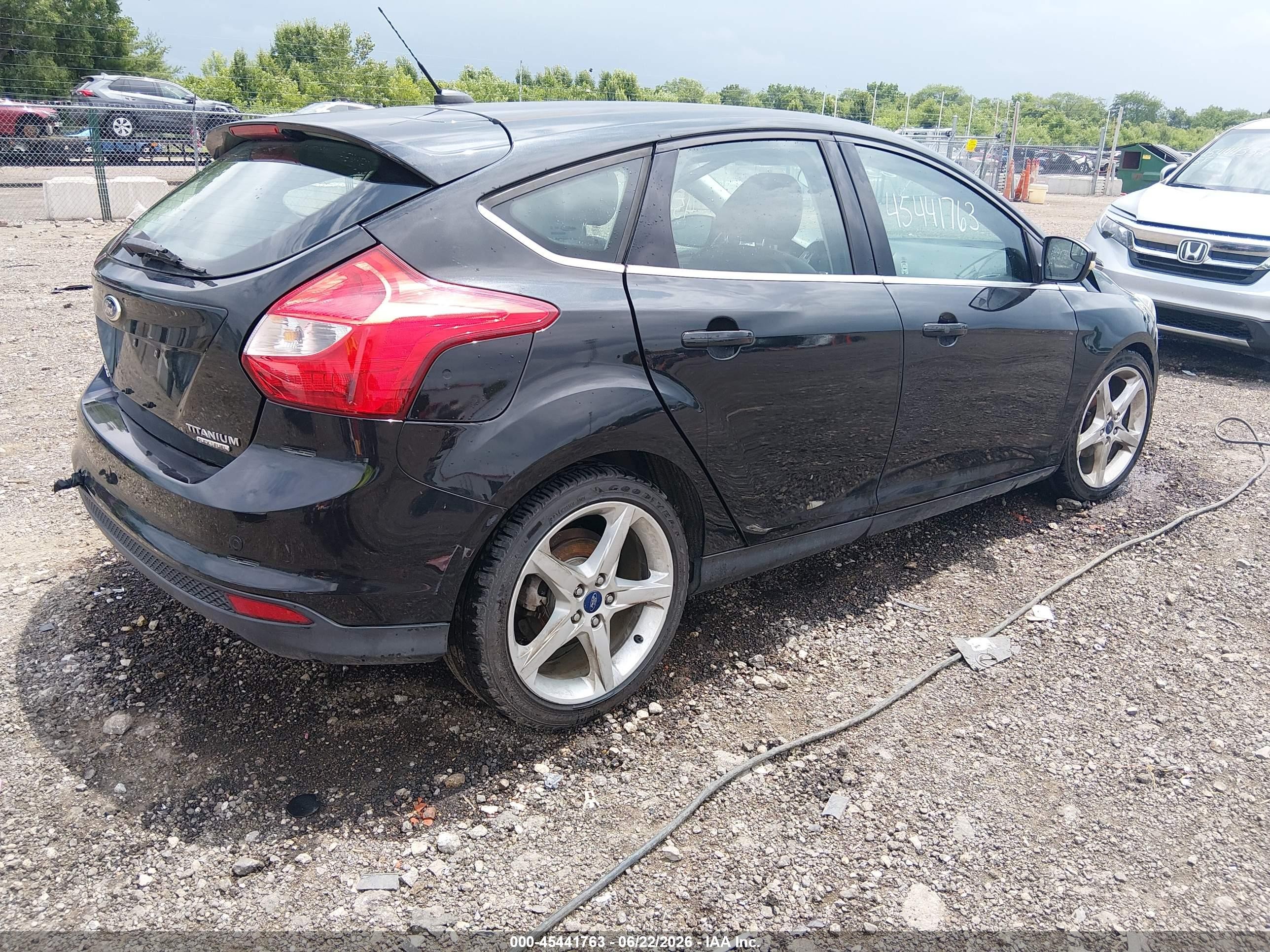 2014 Ford Focus Titanium Black vin: 1FADP3N22EL449796