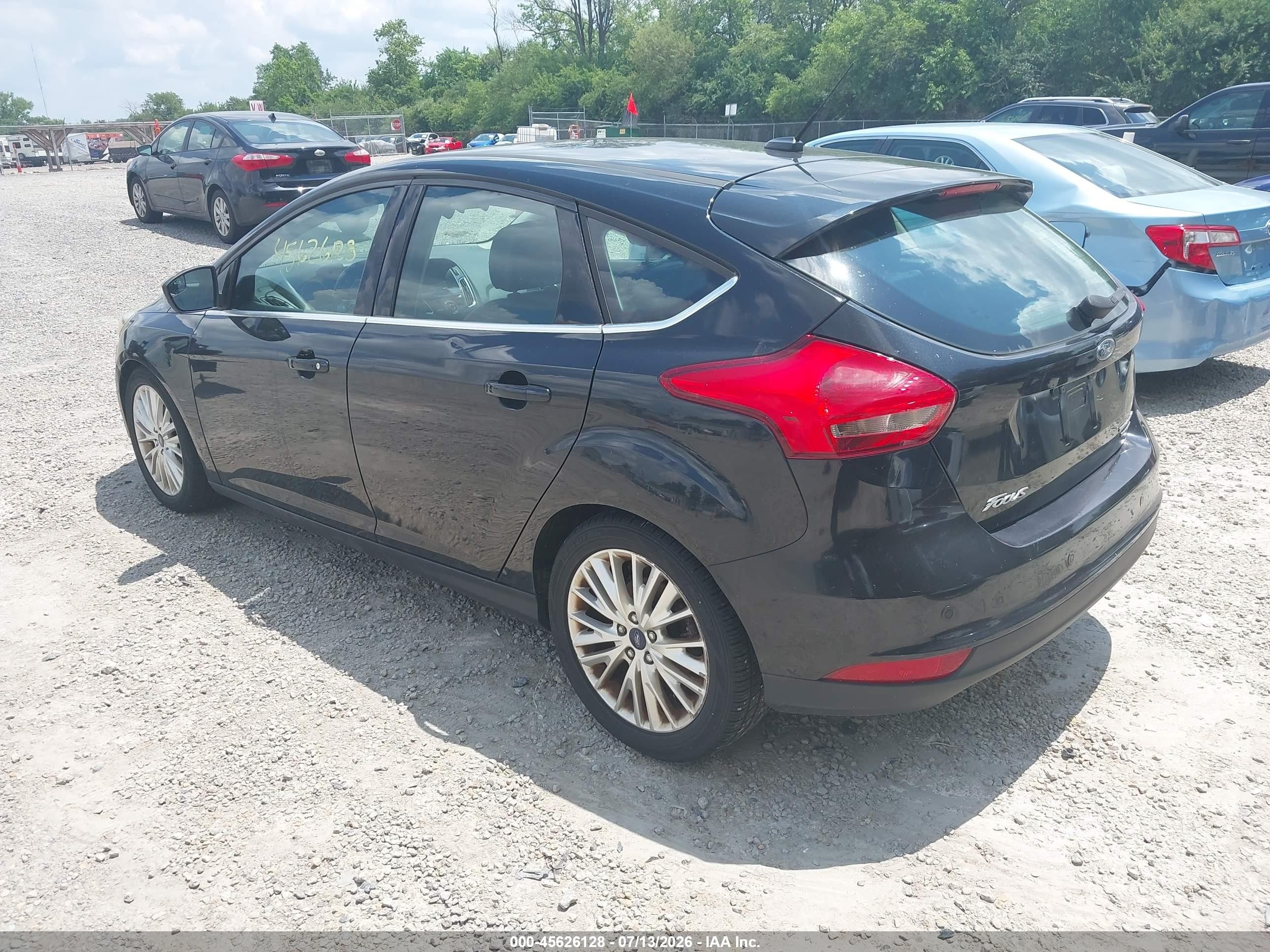2015 Ford Focus Titanium Black vin: 1FADP3N22FL356018