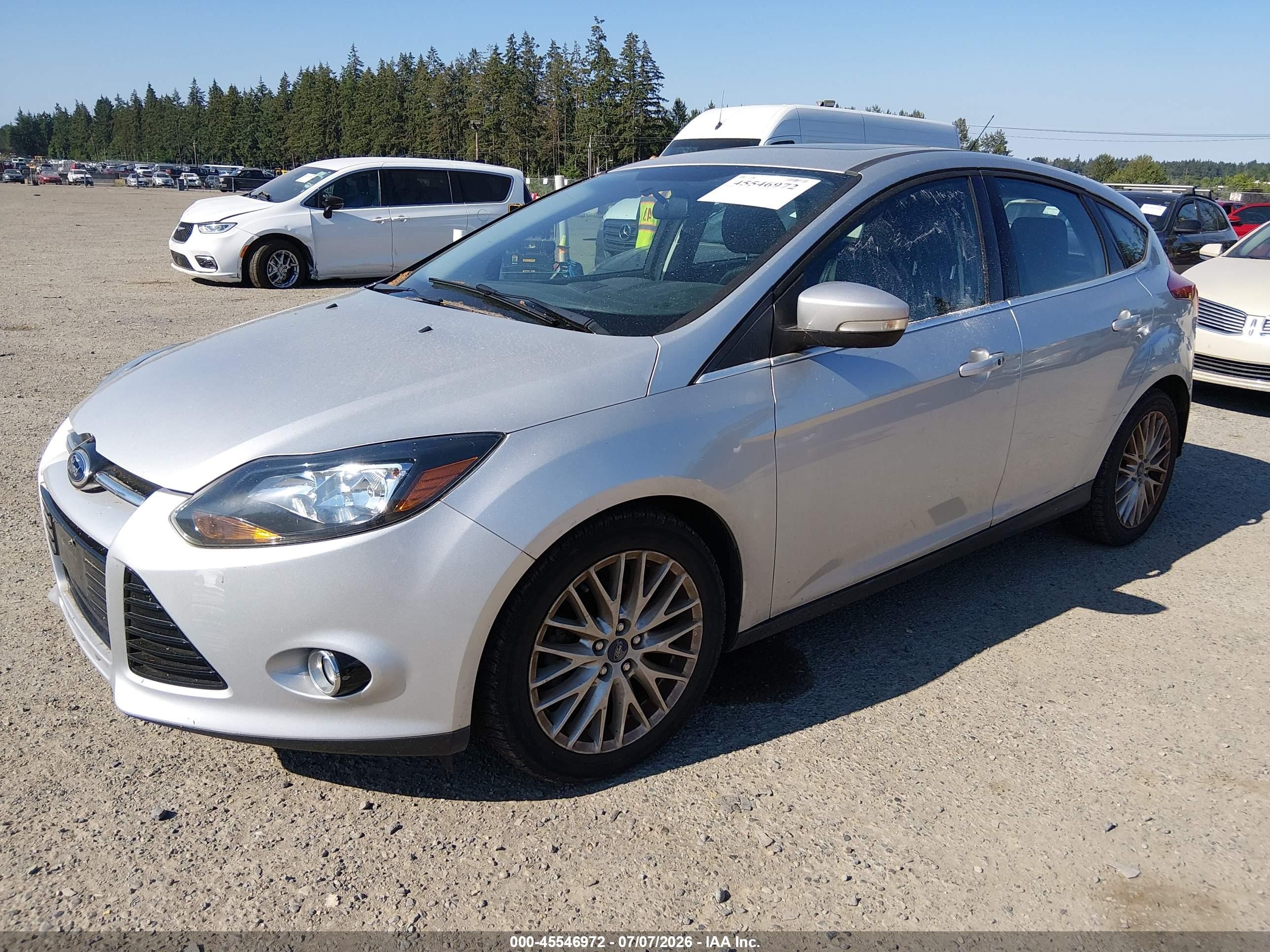 2013 Ford Focus Titanium Серебряный vin: 1FADP3N23DL226956