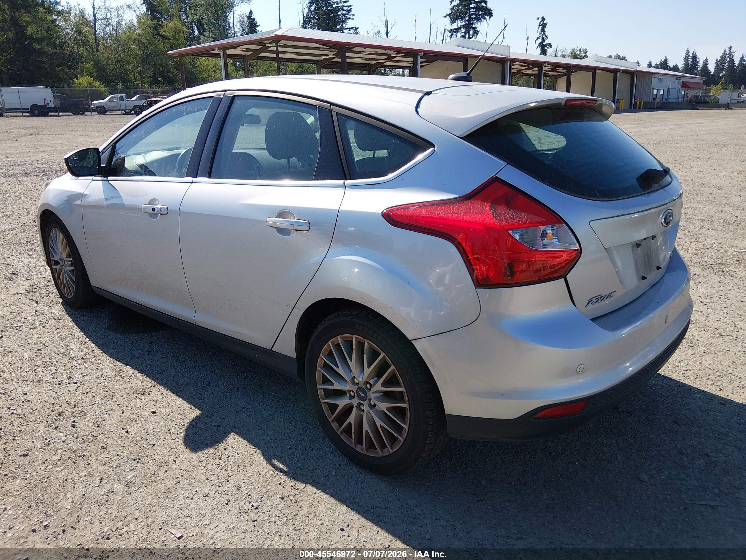 2013 Ford Focus Titanium Серебряный vin: 1FADP3N23DL226956