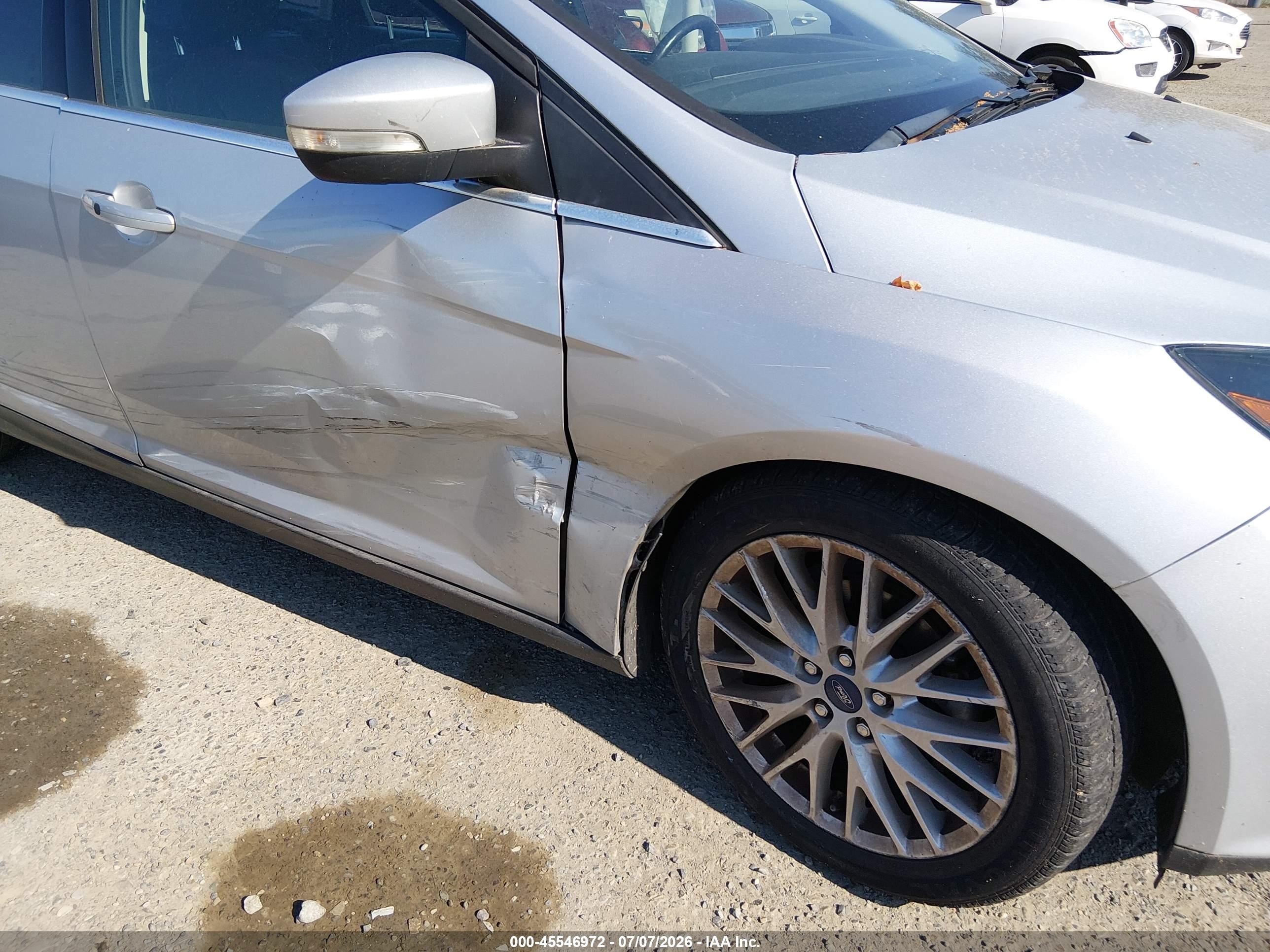 2013 Ford Focus Titanium Серебряный vin: 1FADP3N23DL226956