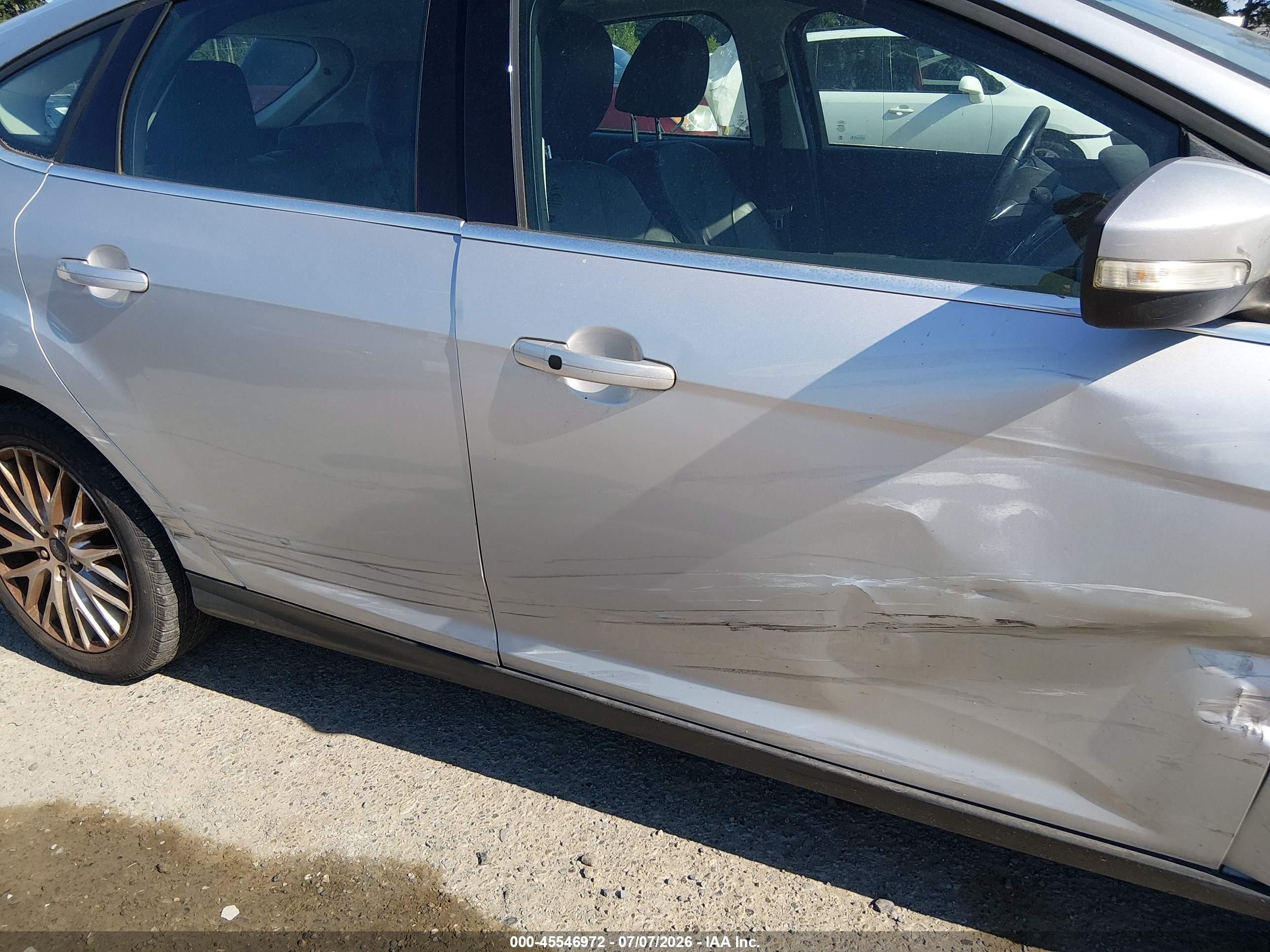2013 Ford Focus Titanium Серебряный vin: 1FADP3N23DL226956