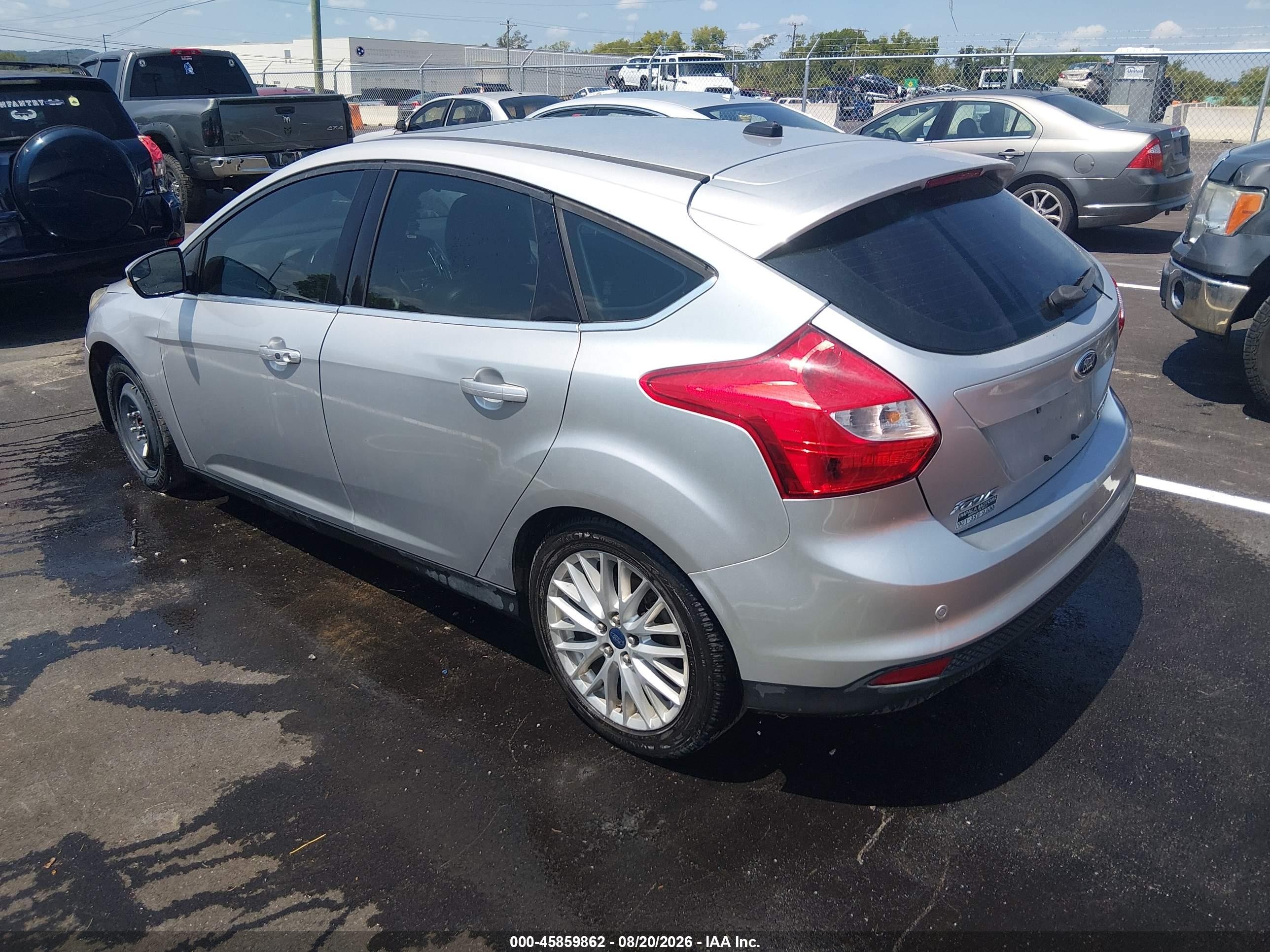 2014 Ford Focus Titanium Серебряный vin: 1FADP3N23EL298080