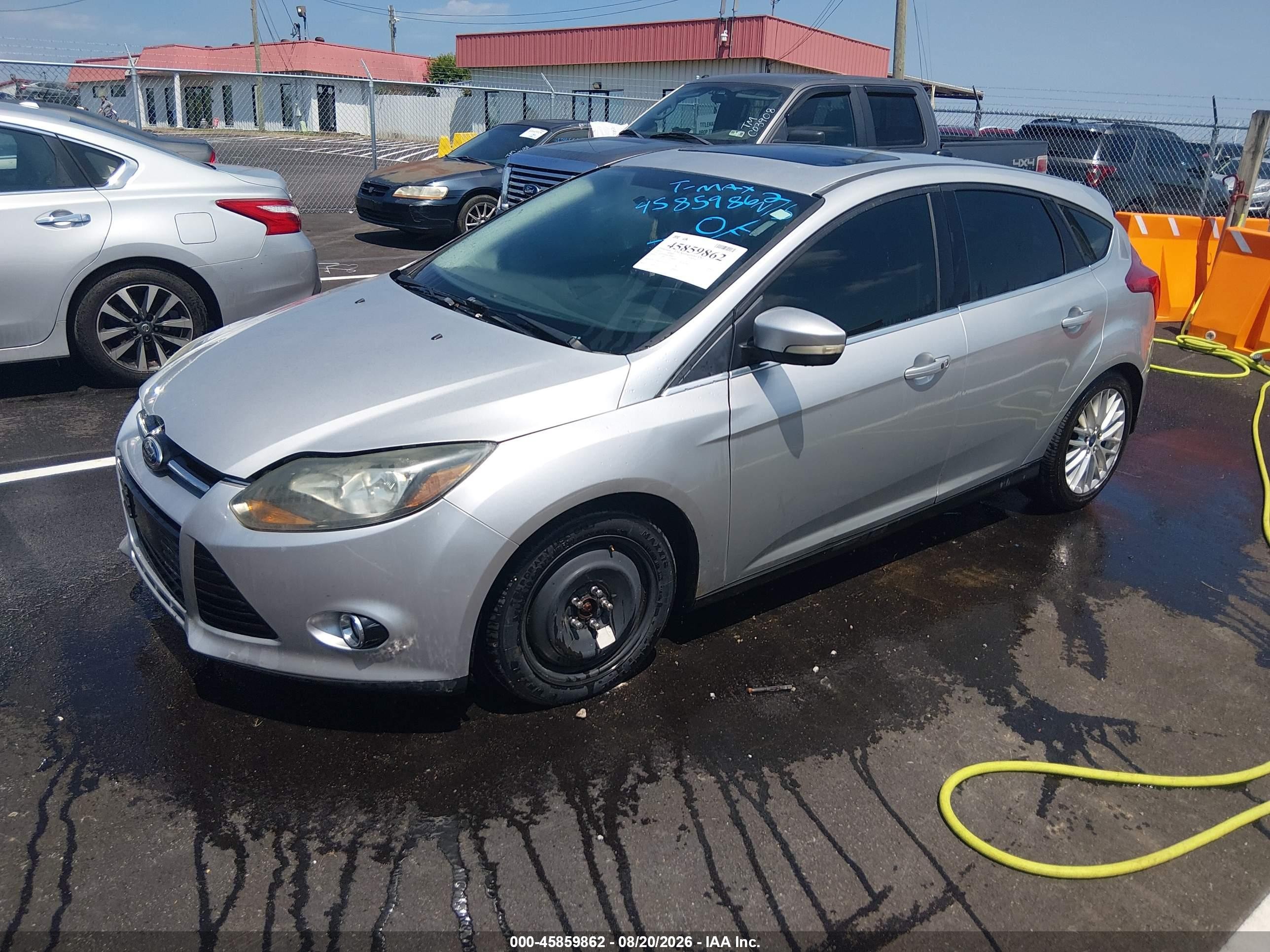 2014 Ford Focus Titanium Серебряный vin: 1FADP3N23EL298080