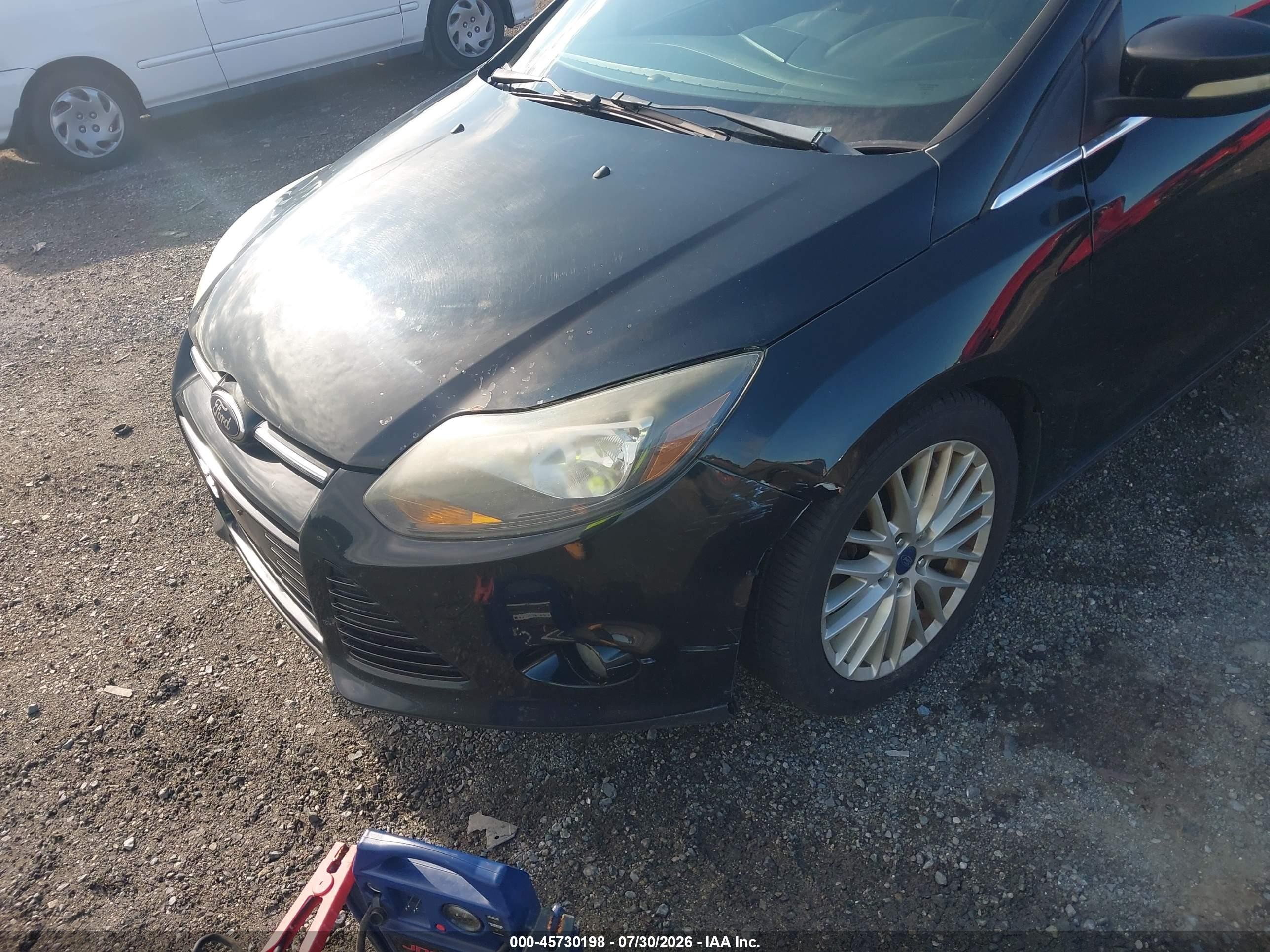 2014 Ford Focus Titanium Black vin: 1FADP3N23EL329683
