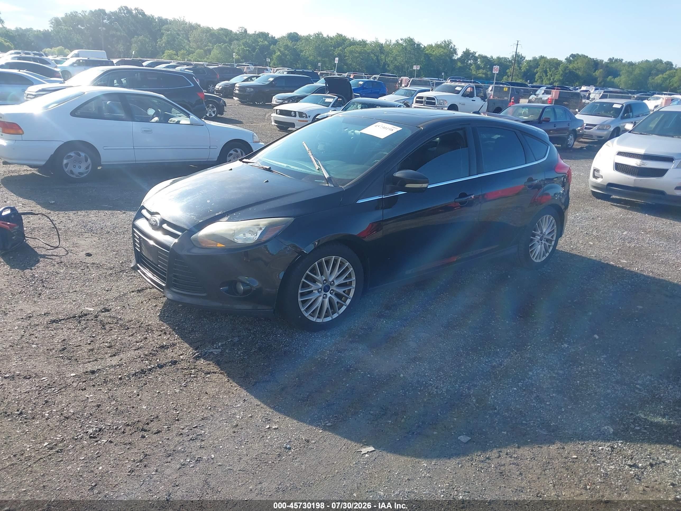 2014 Ford Focus Titanium Black vin: 1FADP3N23EL329683