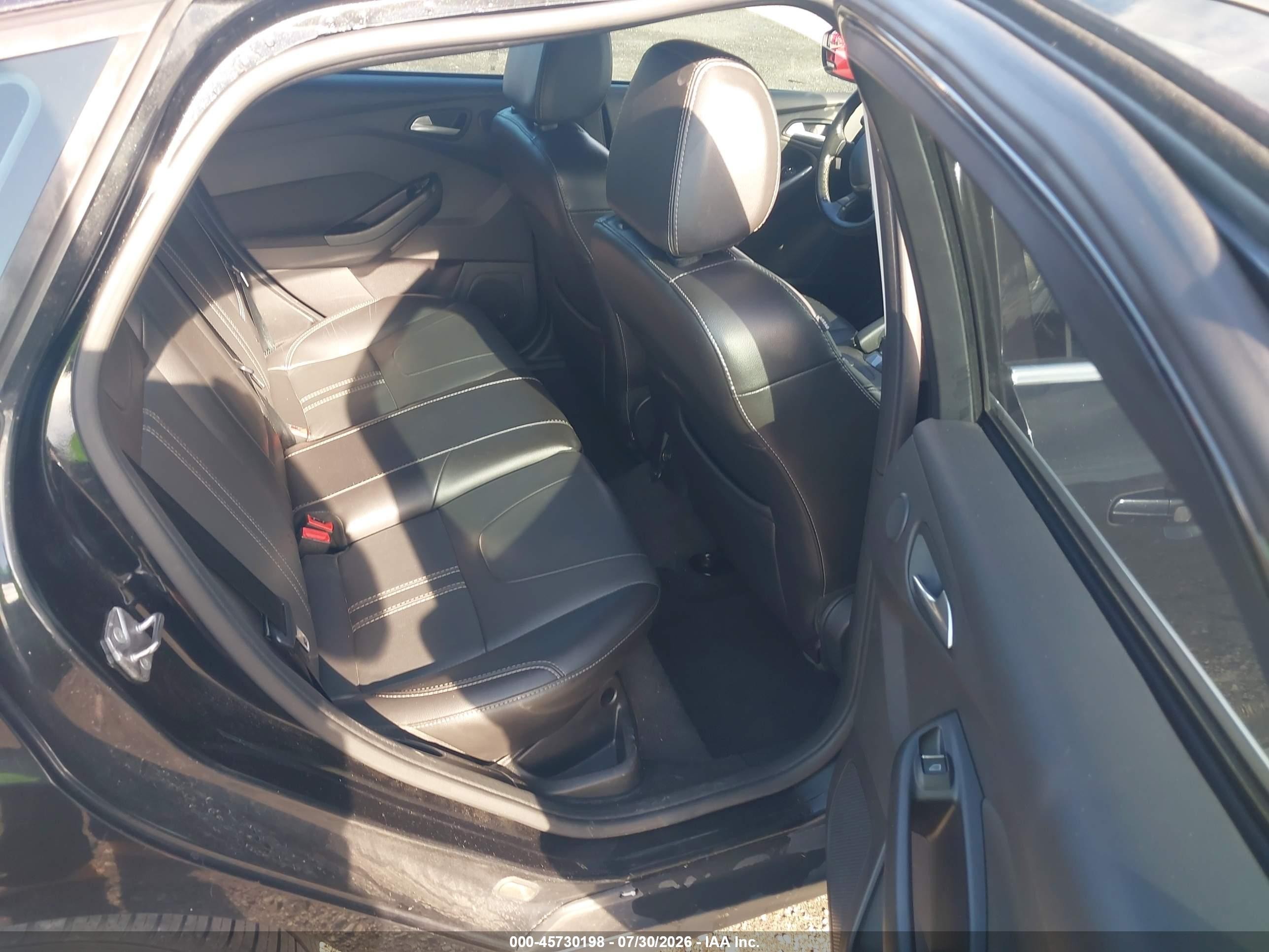 2014 Ford Focus Titanium Black vin: 1FADP3N23EL329683
