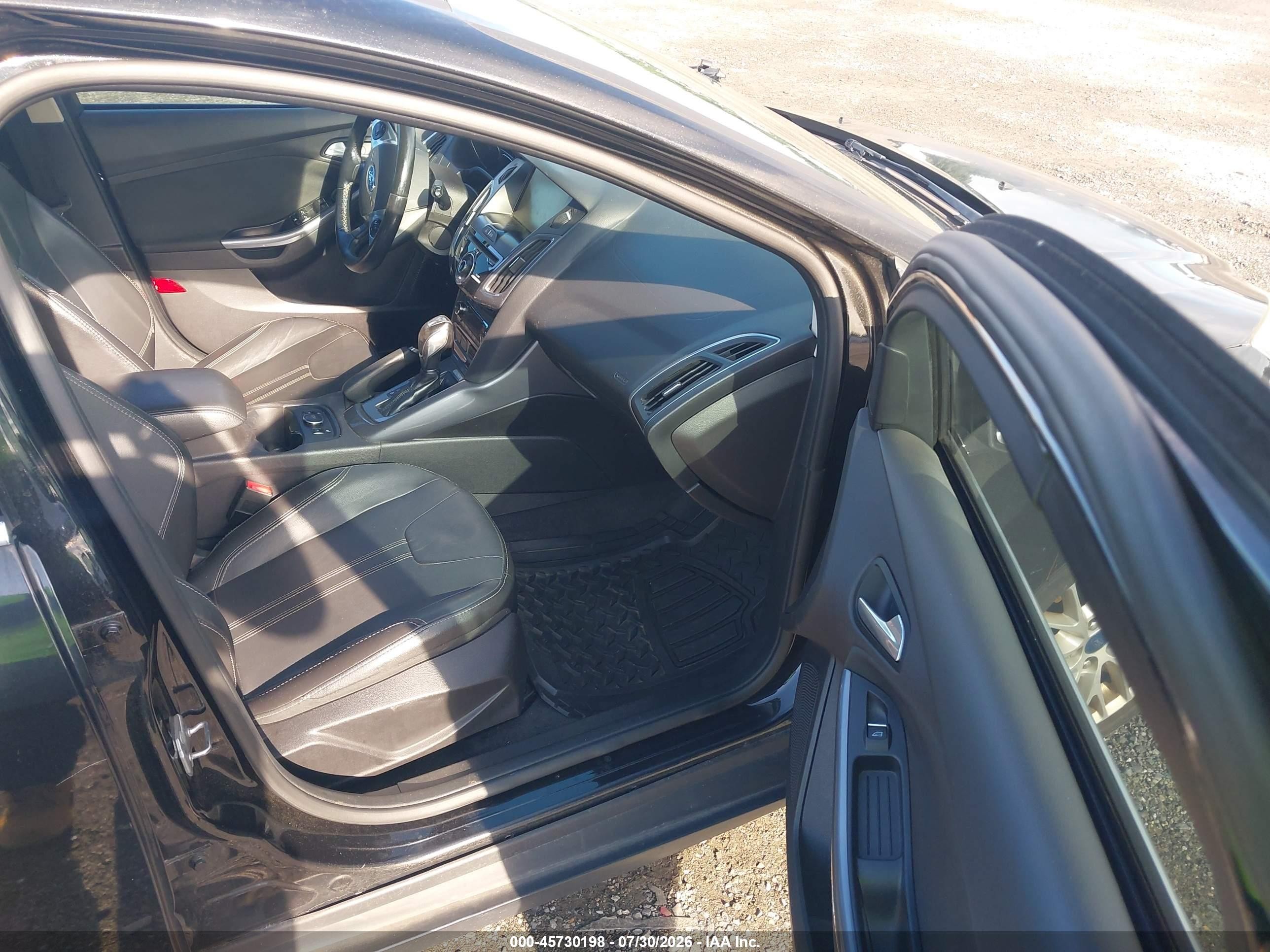 2014 Ford Focus Titanium Black vin: 1FADP3N23EL329683