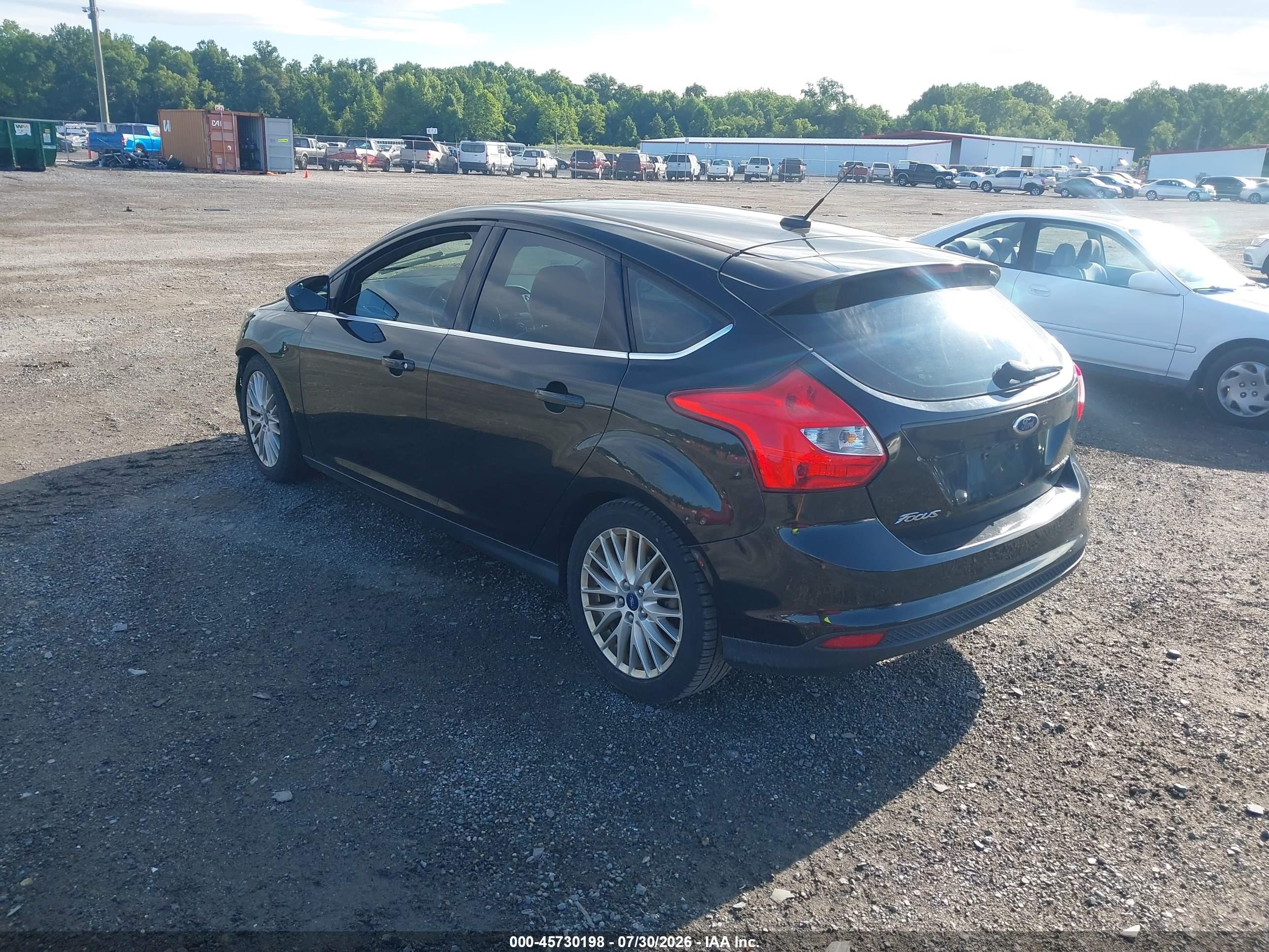 2014 Ford Focus Titanium Black vin: 1FADP3N23EL329683