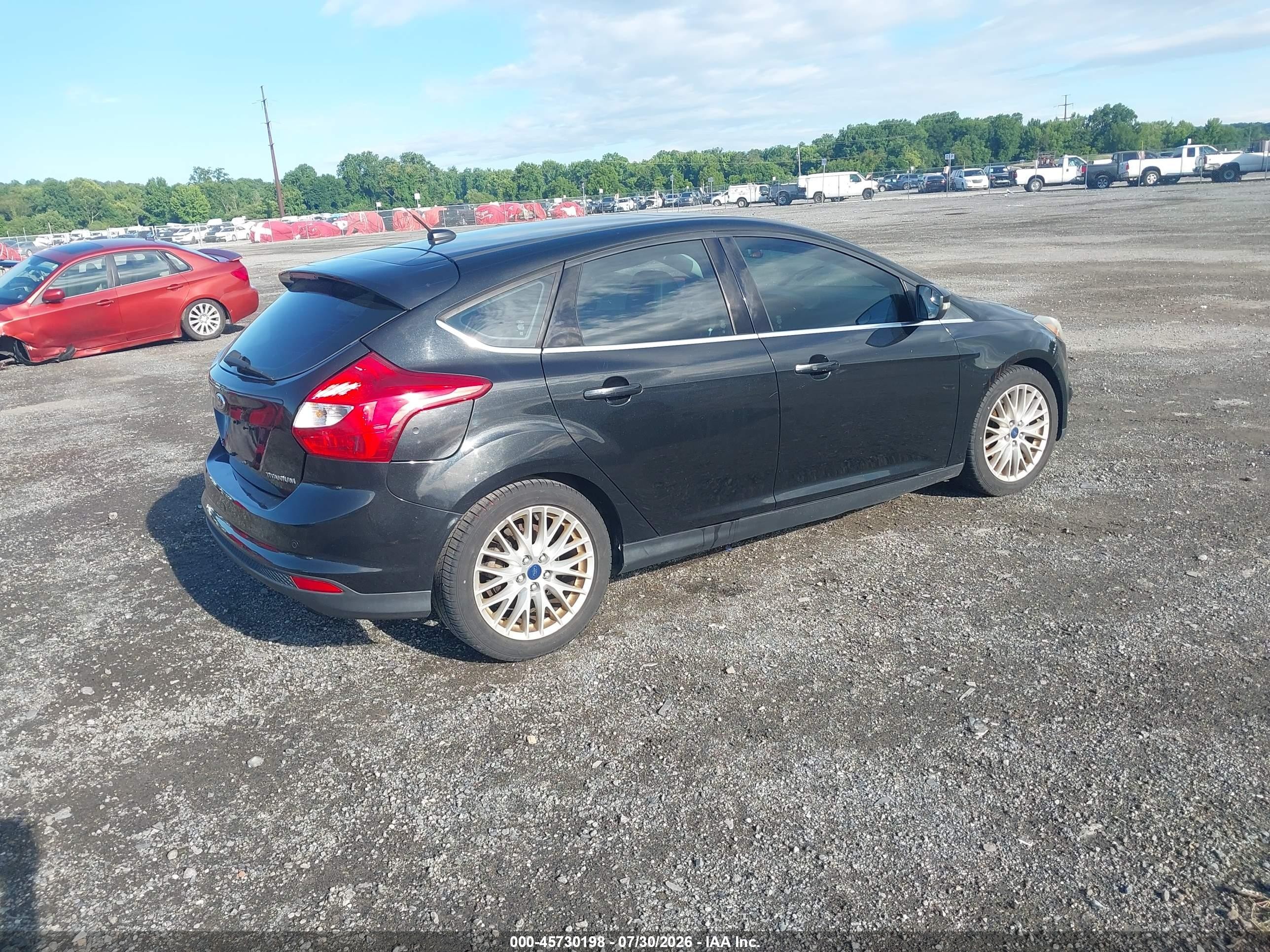 2014 Ford Focus Titanium Black vin: 1FADP3N23EL329683