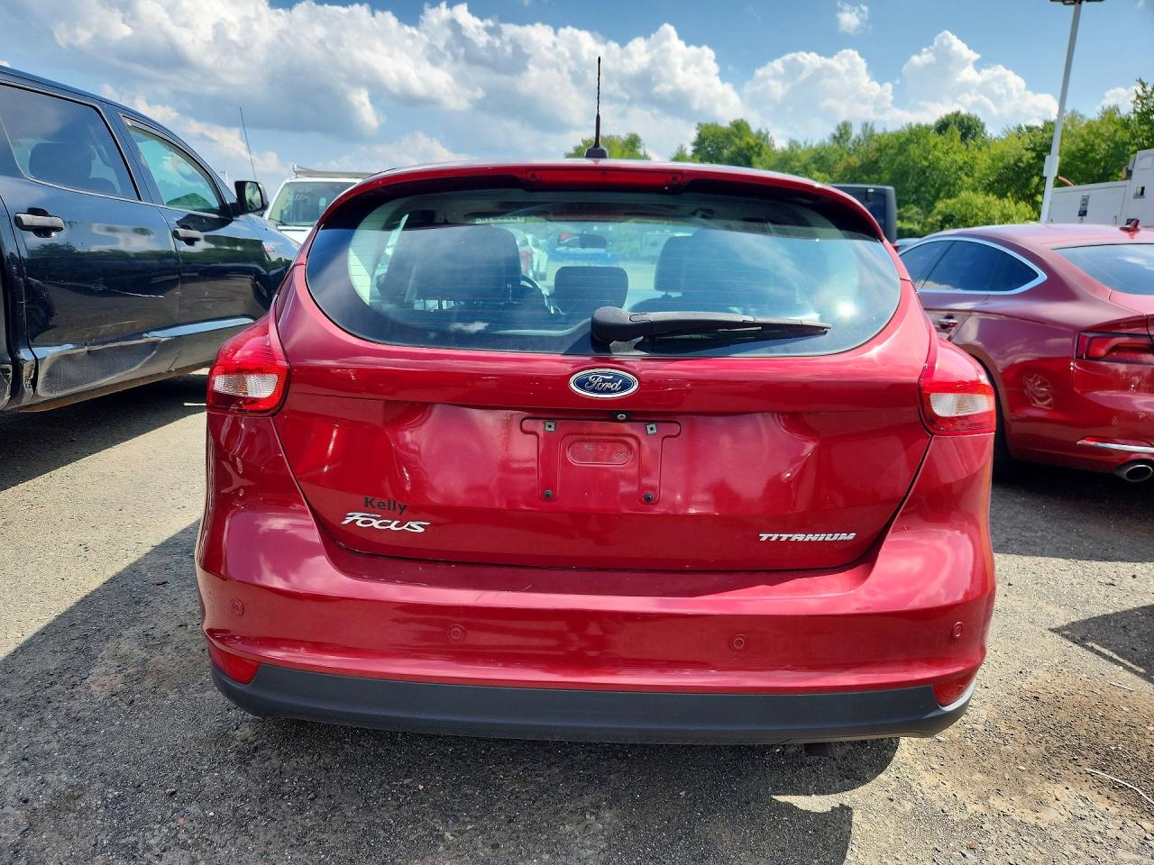 2015 Ford Focus Titanium Red vin: 1FADP3N23FL227091