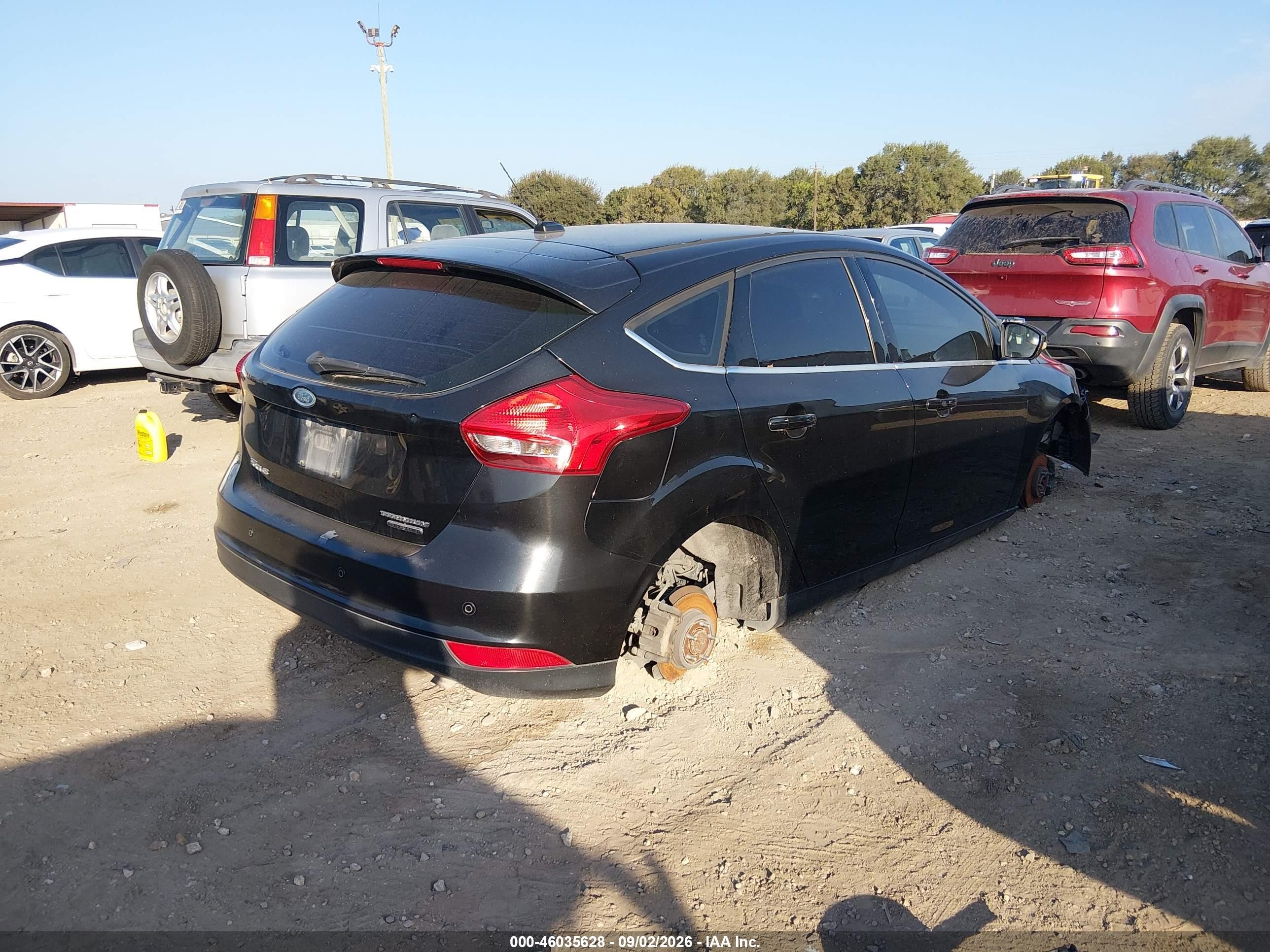 2015 Ford Focus Titanium Black vin: 1FADP3N23FL230685