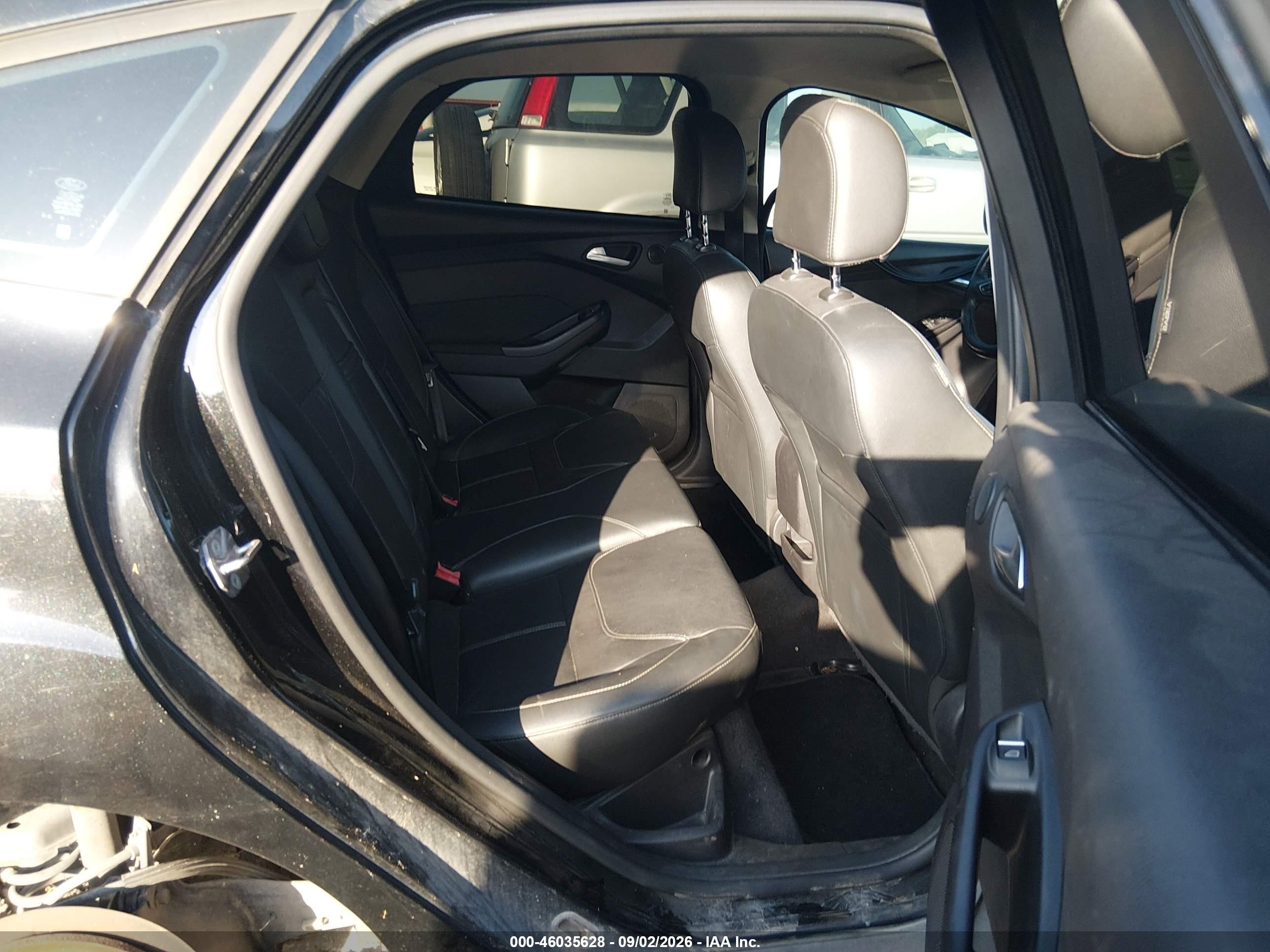 2015 Ford Focus Titanium Black vin: 1FADP3N23FL230685