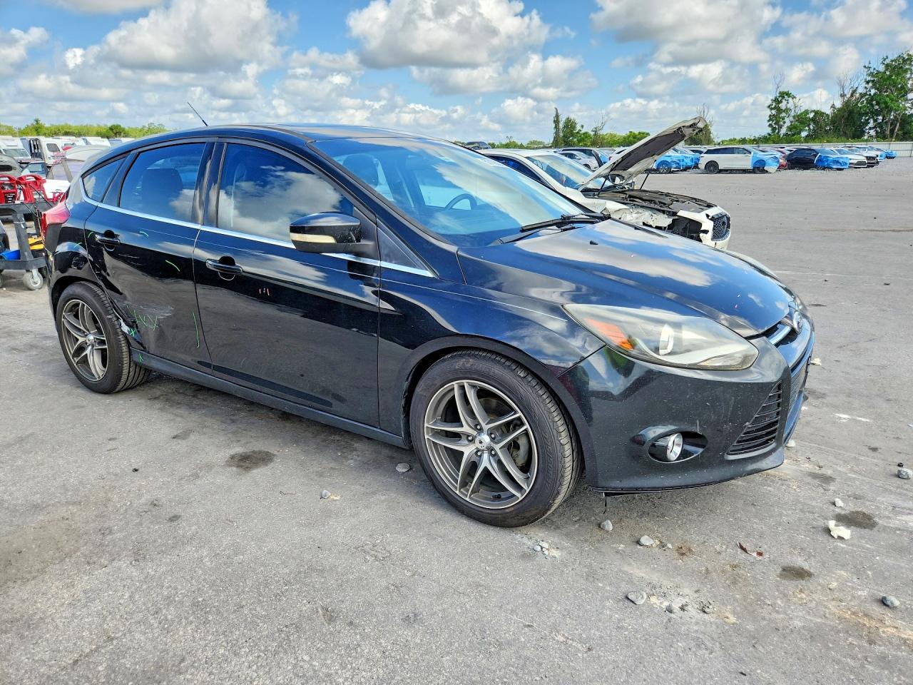 2013 Ford Focus Titanium Black vin: 1FADP3N24DL169814