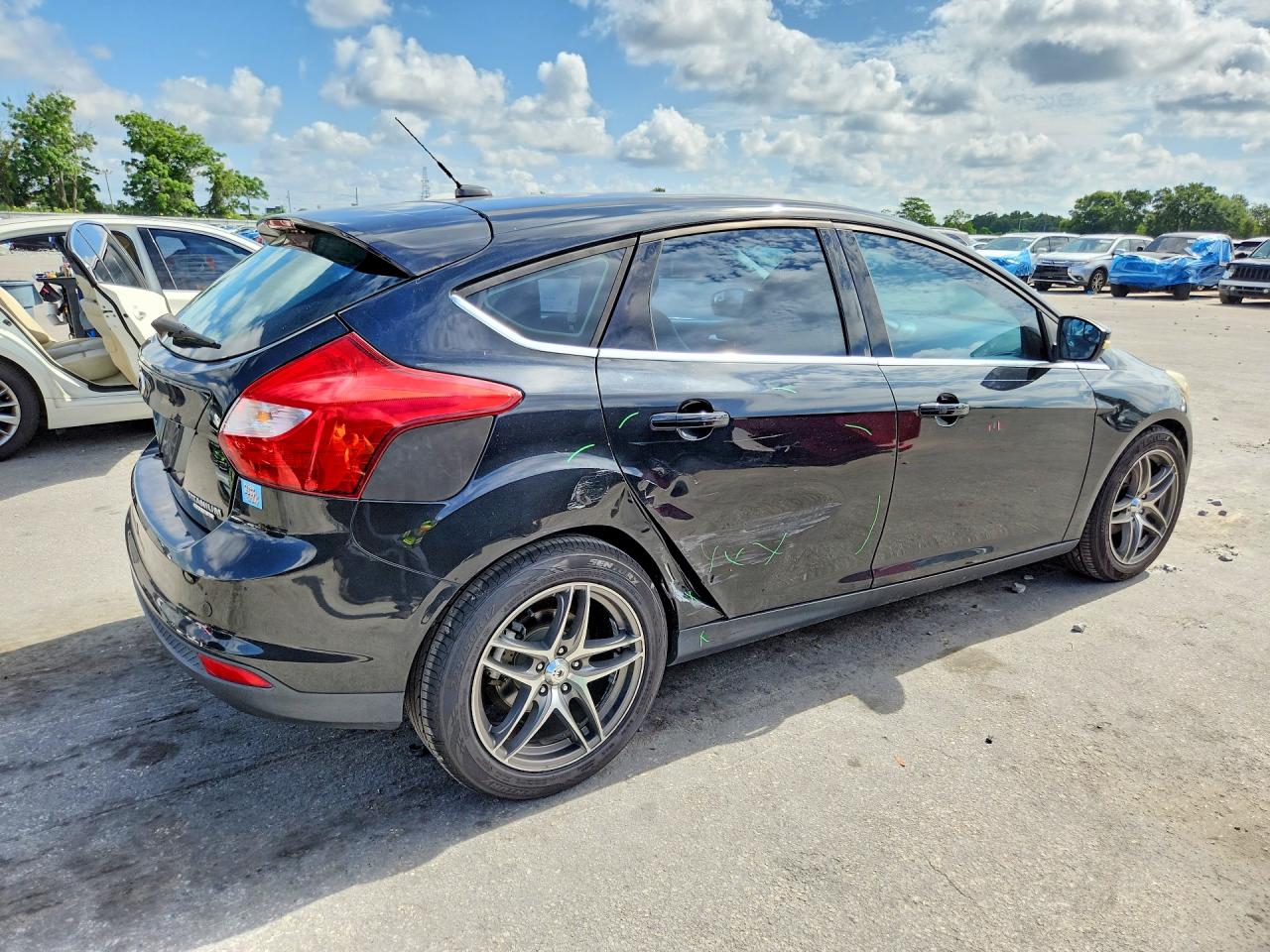 2013 Ford Focus Titanium Black vin: 1FADP3N24DL169814