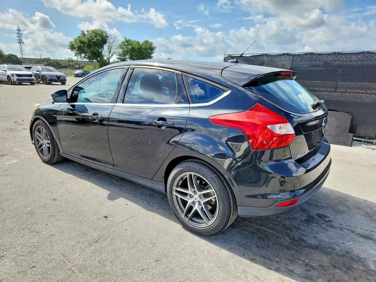 2013 Ford Focus Titanium Black vin: 1FADP3N24DL169814