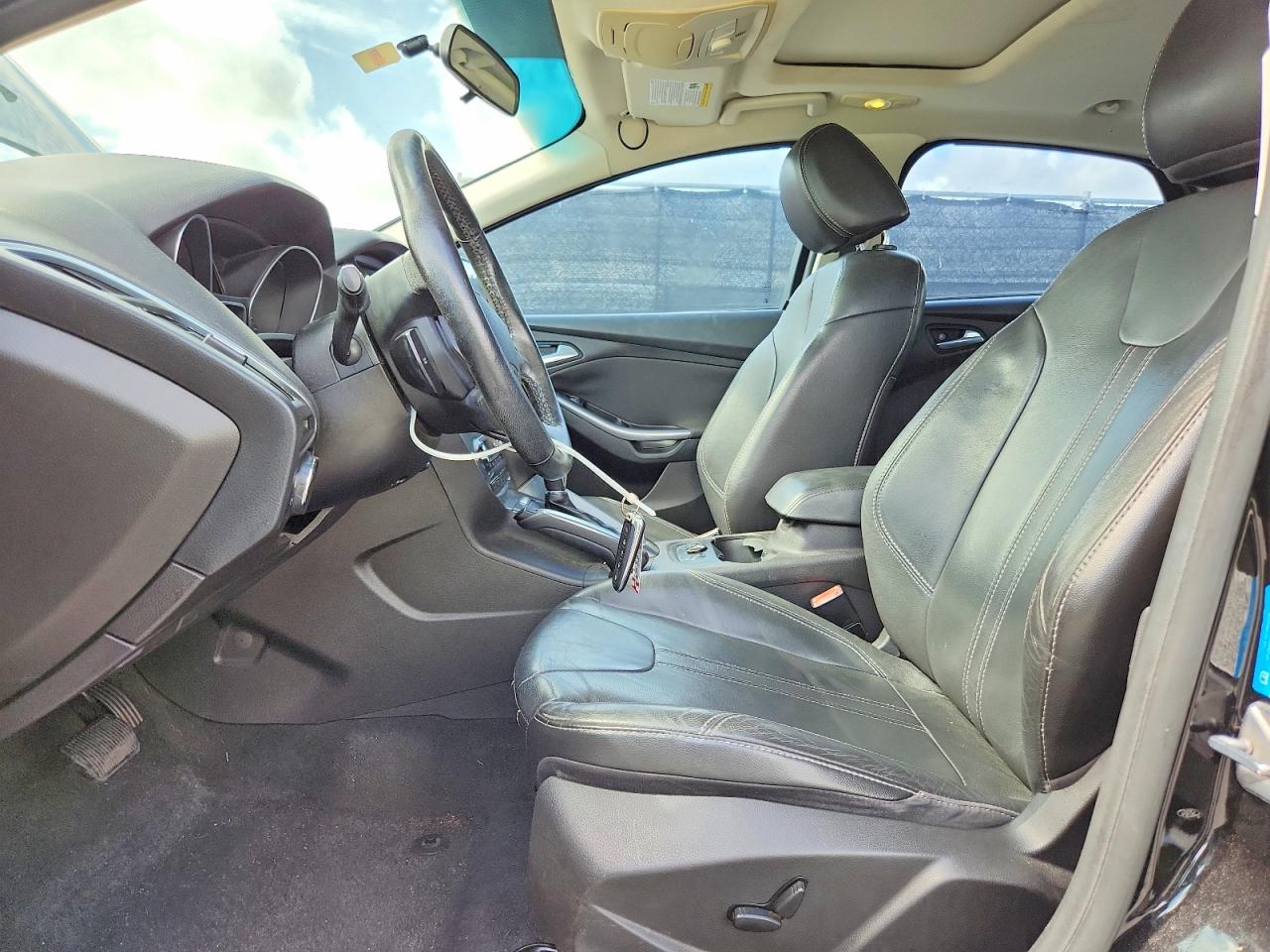 2013 Ford Focus Titanium Black vin: 1FADP3N24DL169814
