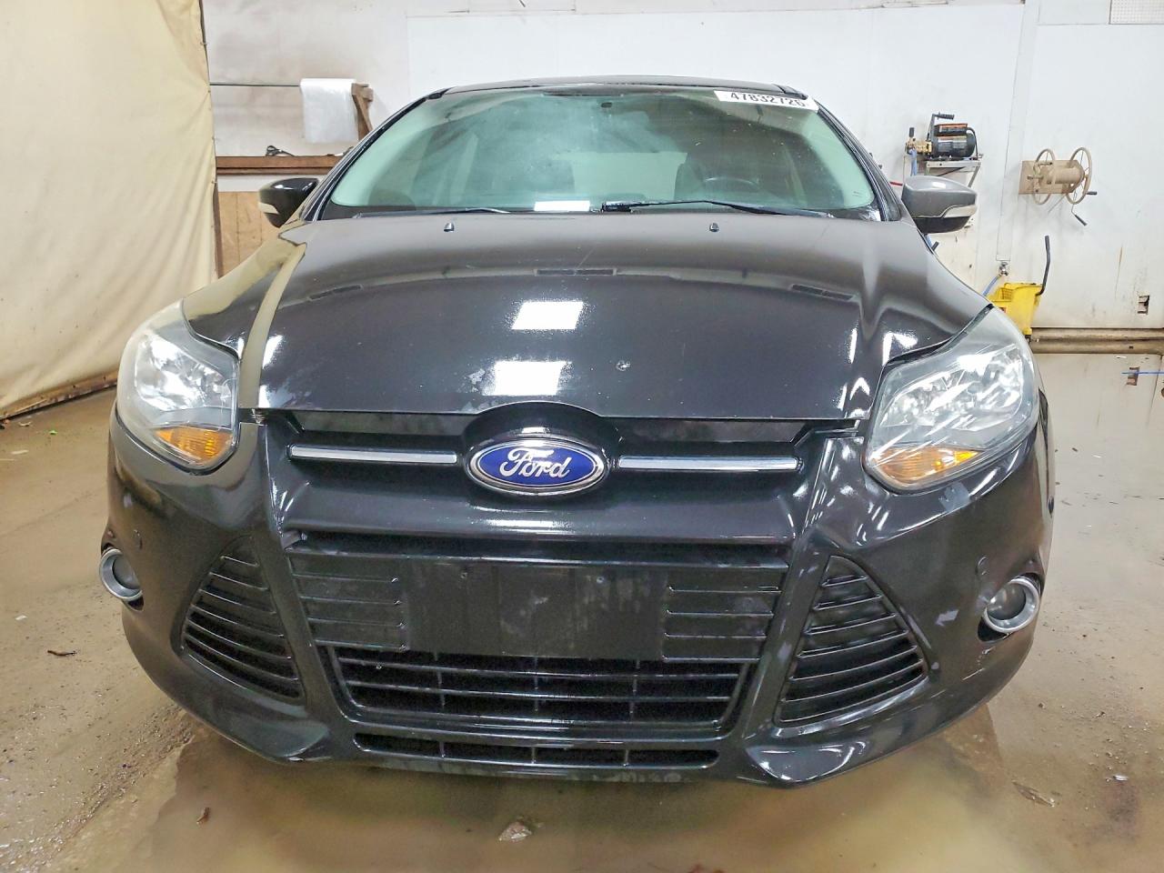 2013 Ford Focus Titanium Black vin: 1FADP3N24DL304015
