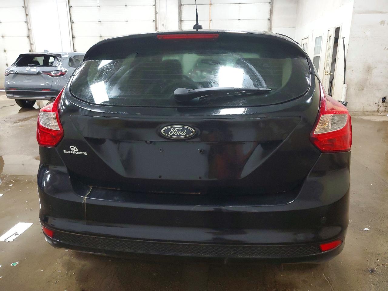 2013 Ford Focus Titanium Black vin: 1FADP3N24DL304015