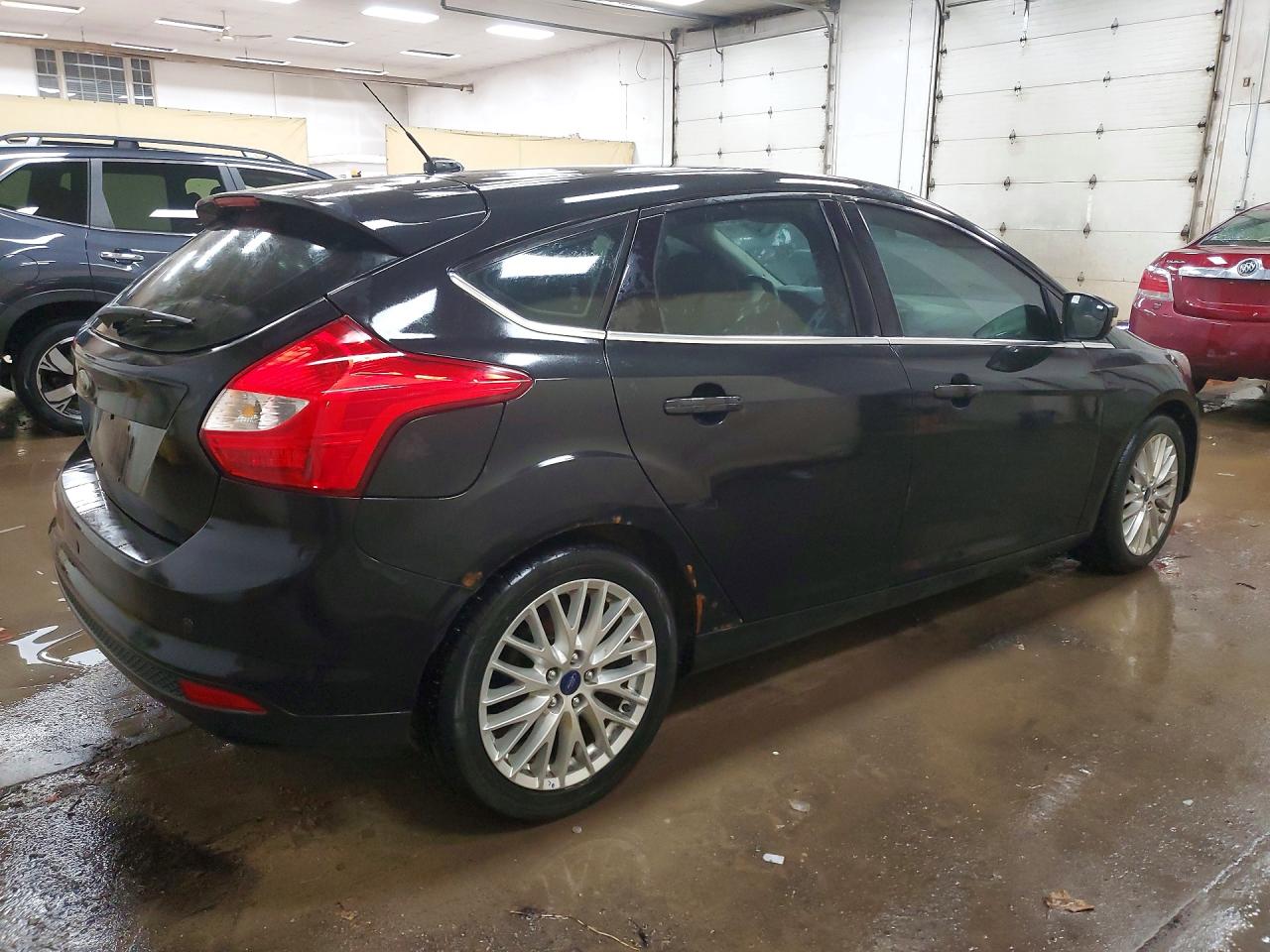 2013 Ford Focus Titanium Black vin: 1FADP3N24DL304015