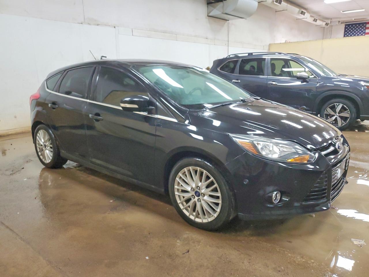 2013 Ford Focus Titanium Black vin: 1FADP3N24DL304015