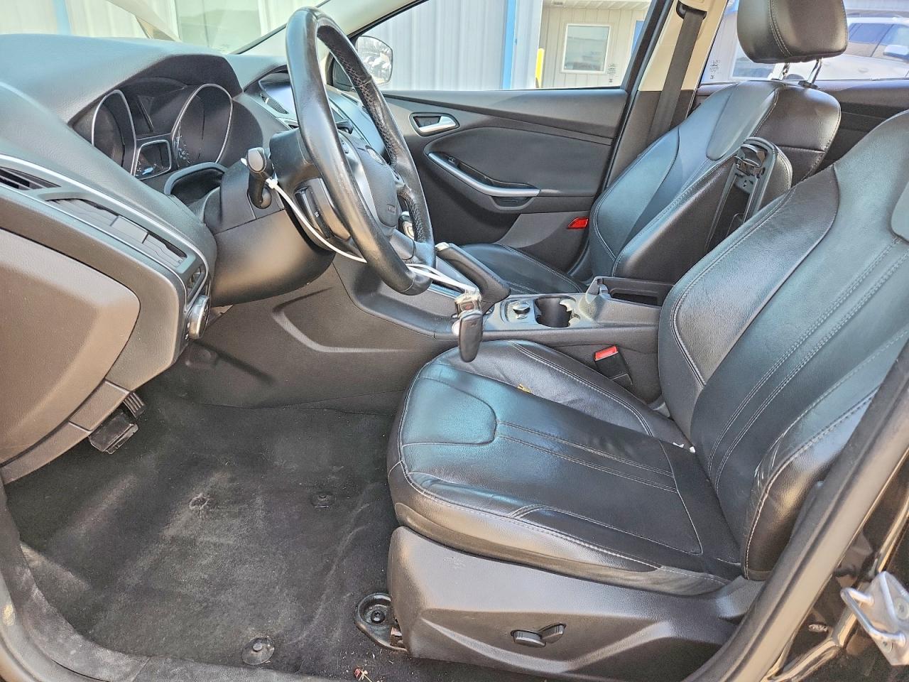 2014 Ford Focus Titanium Black vin: 1FADP3N24EL184377