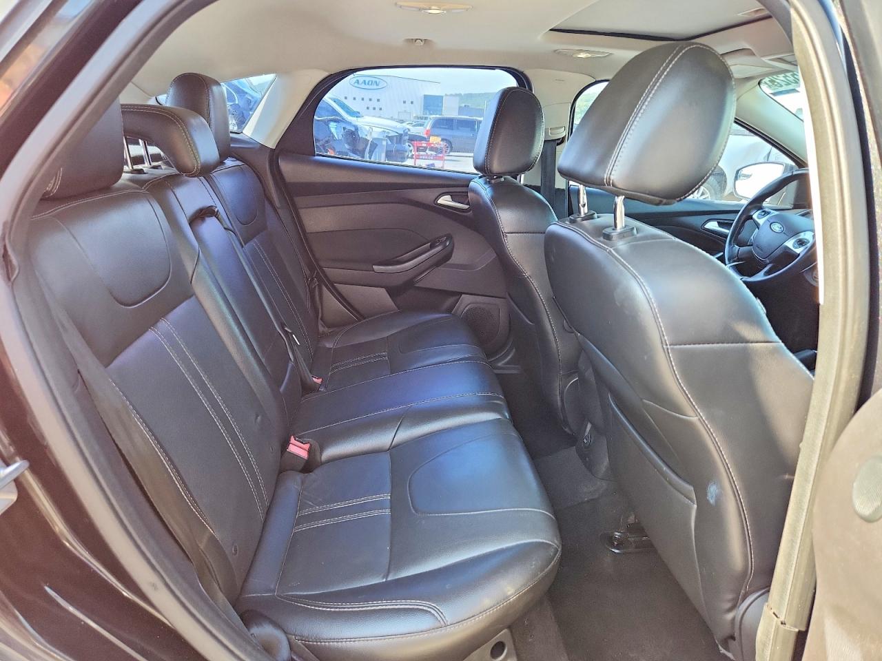 2014 Ford Focus Titanium Black vin: 1FADP3N24EL184377