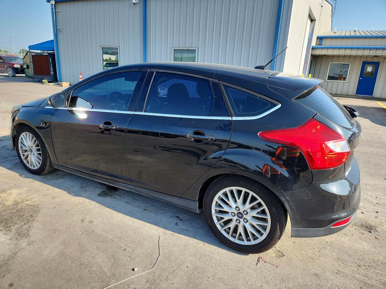 2014 Ford Focus Titanium Black vin: 1FADP3N24EL184377