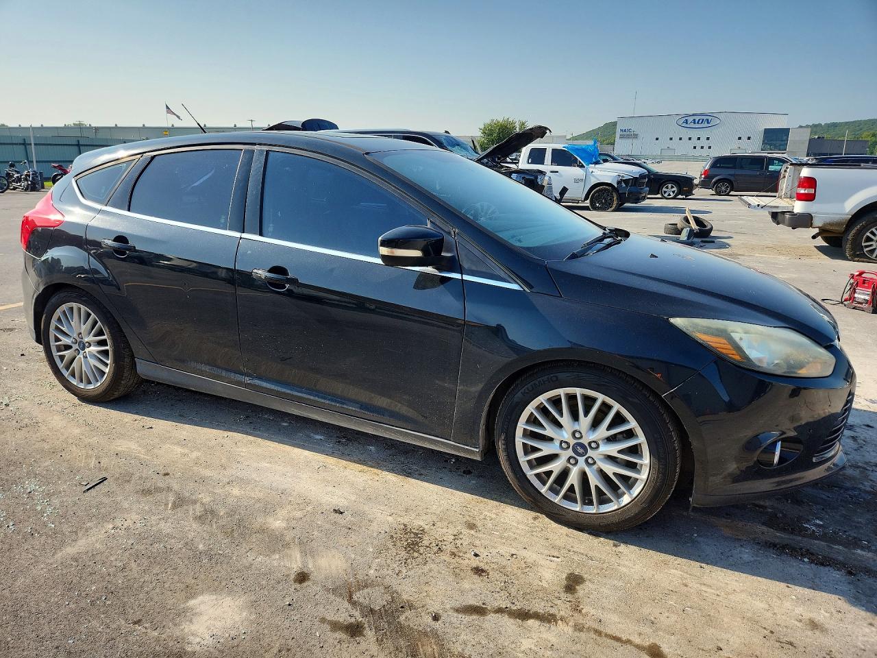 2014 Ford Focus Titanium Black vin: 1FADP3N24EL184377