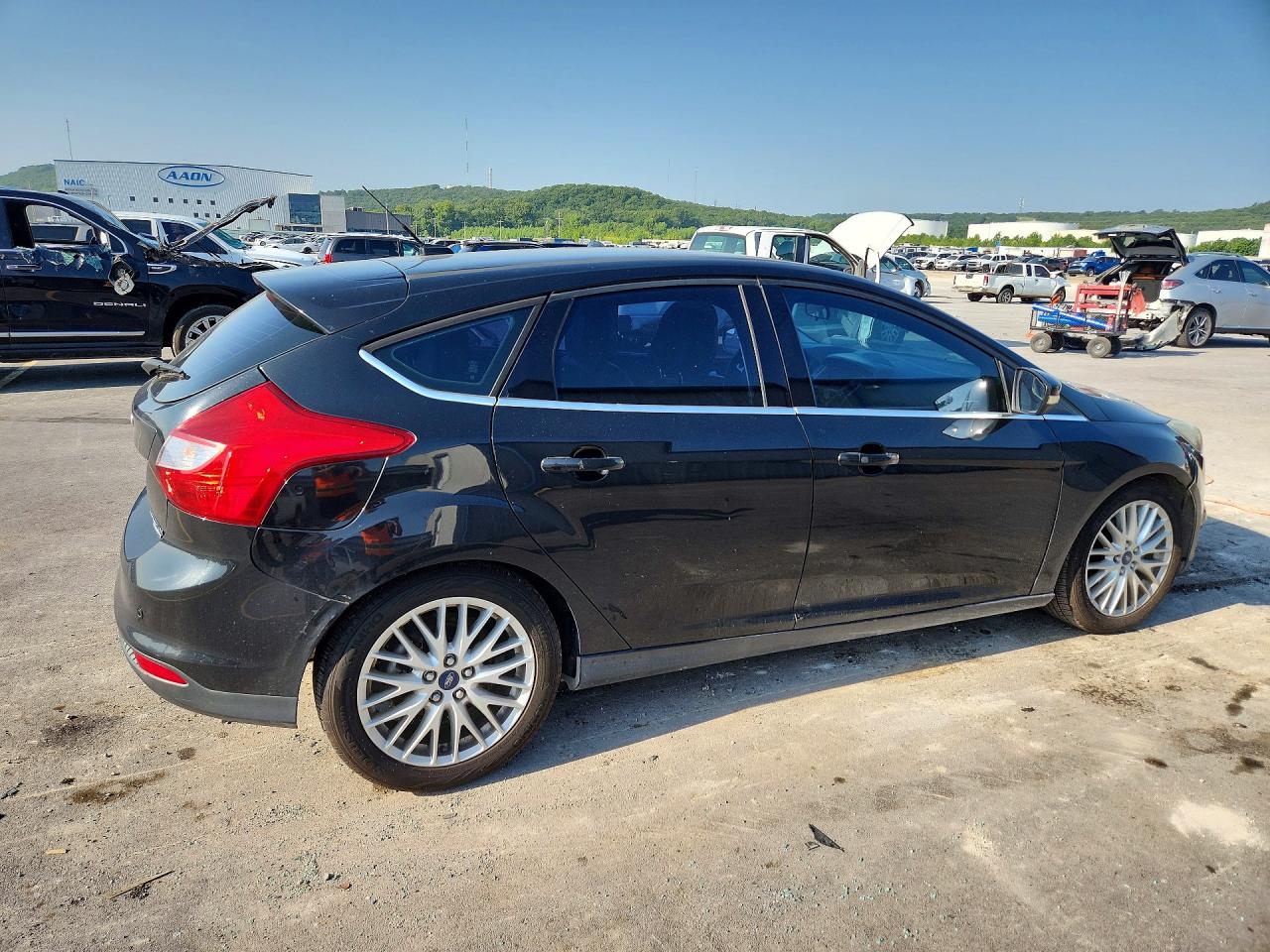 2014 Ford Focus Titanium Black vin: 1FADP3N24EL184377
