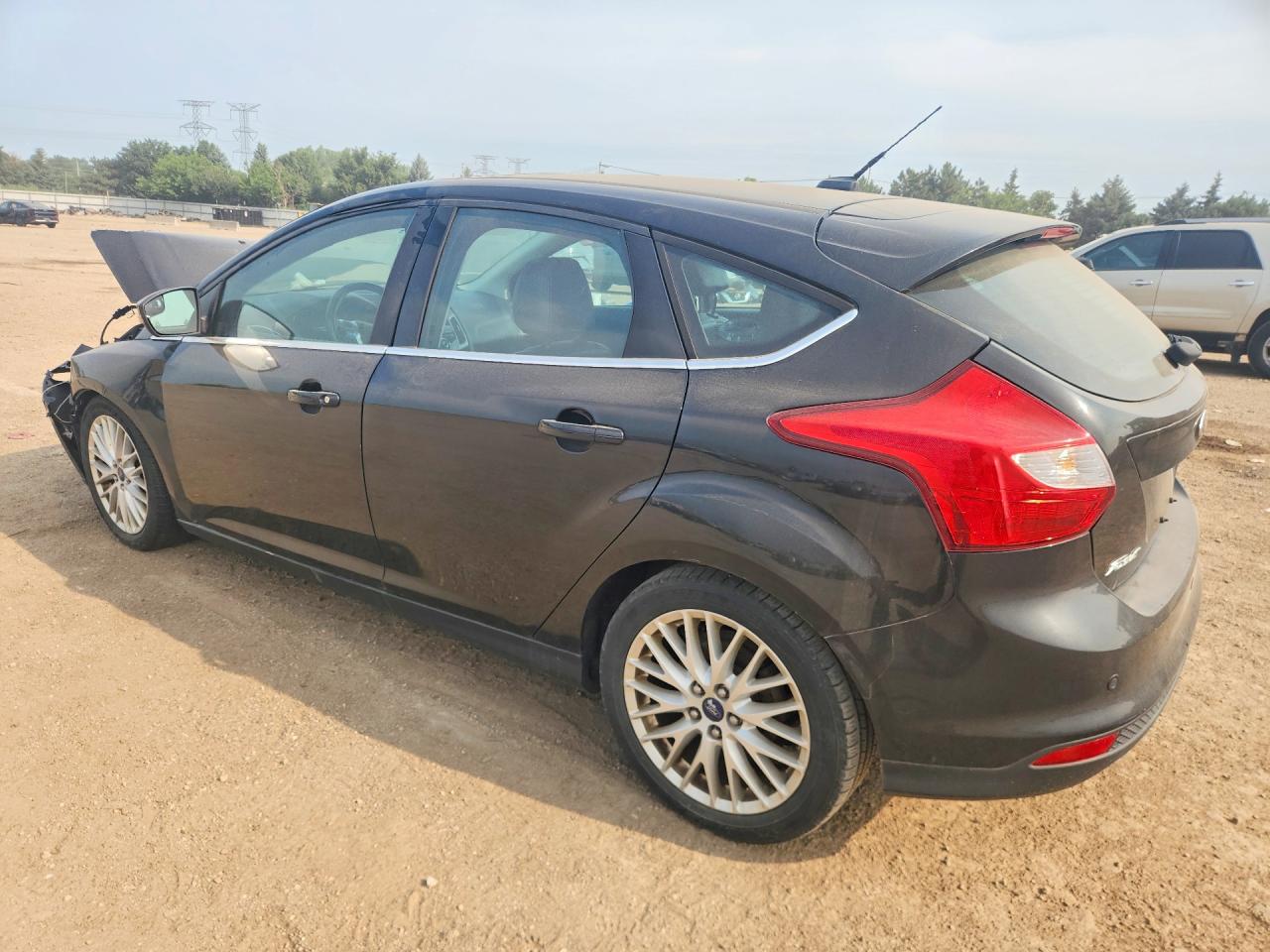 2014 Ford Focus Titanium Черный vin: 1FADP3N24EL280297