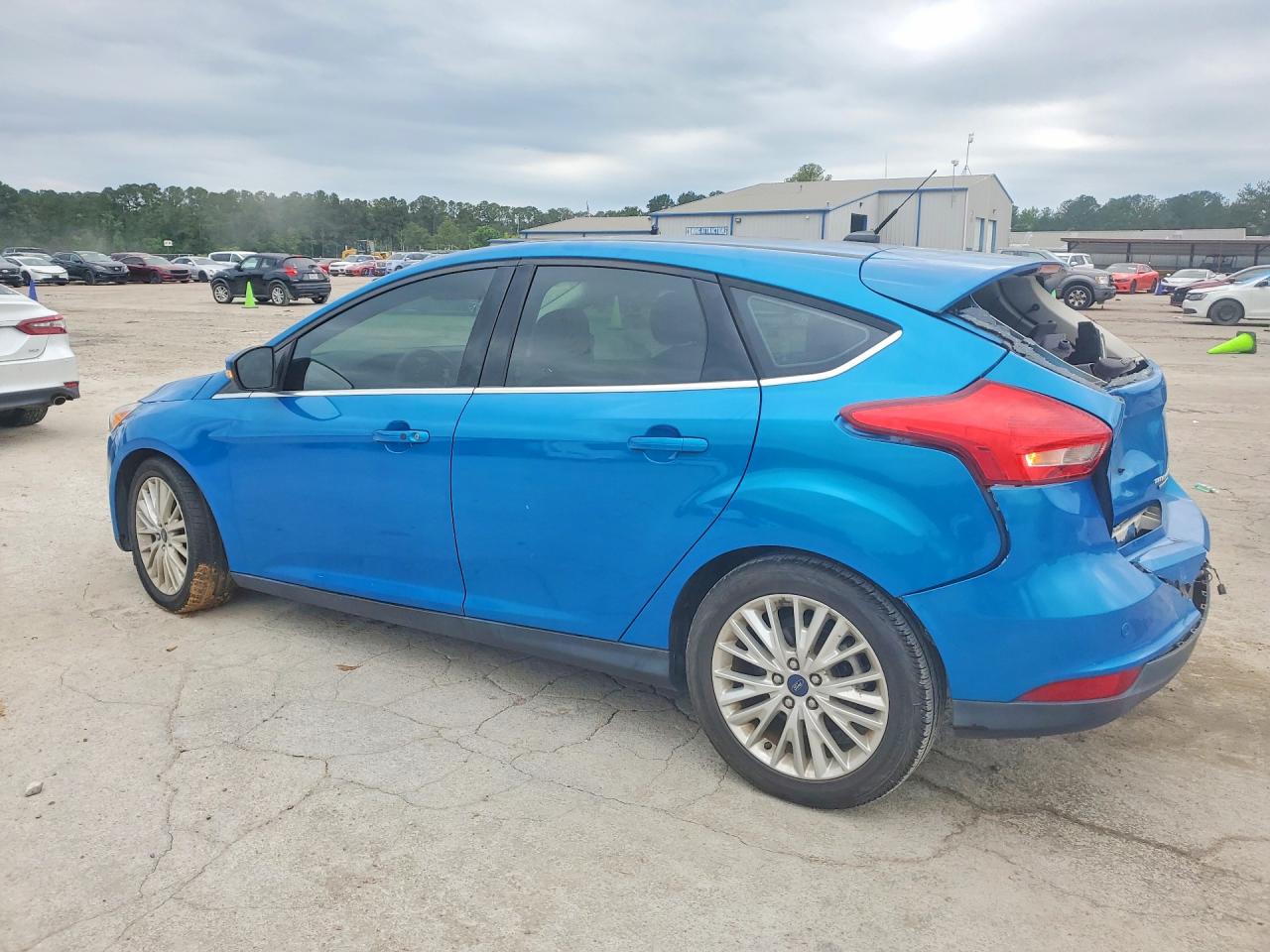 2015 Ford Focus Titanium Blue vin: 1FADP3N24FL293391