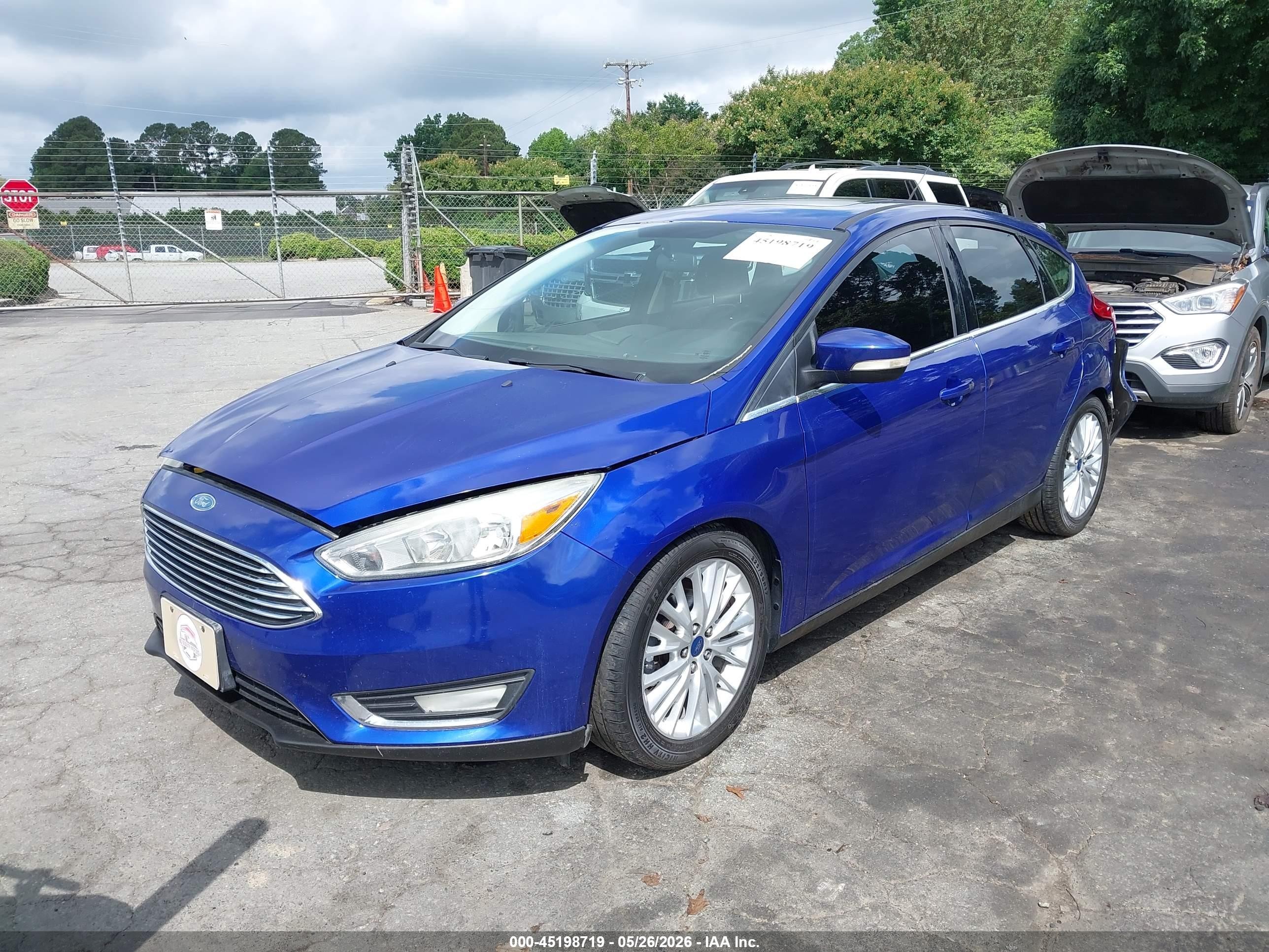 2015 Ford Focus Titanium Blue vin: 1FADP3N24FL339589