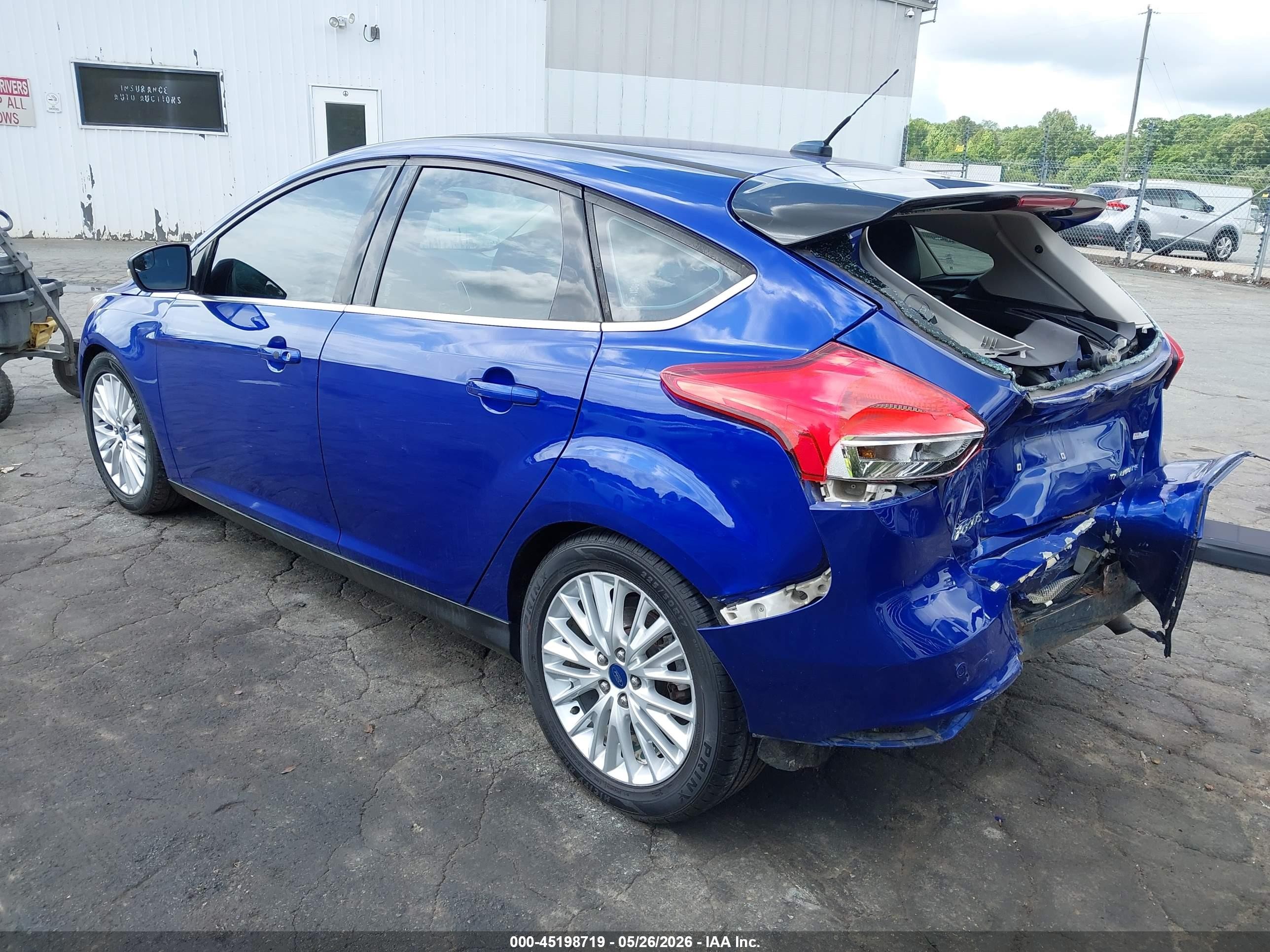 2015 Ford Focus Titanium Blue vin: 1FADP3N24FL339589