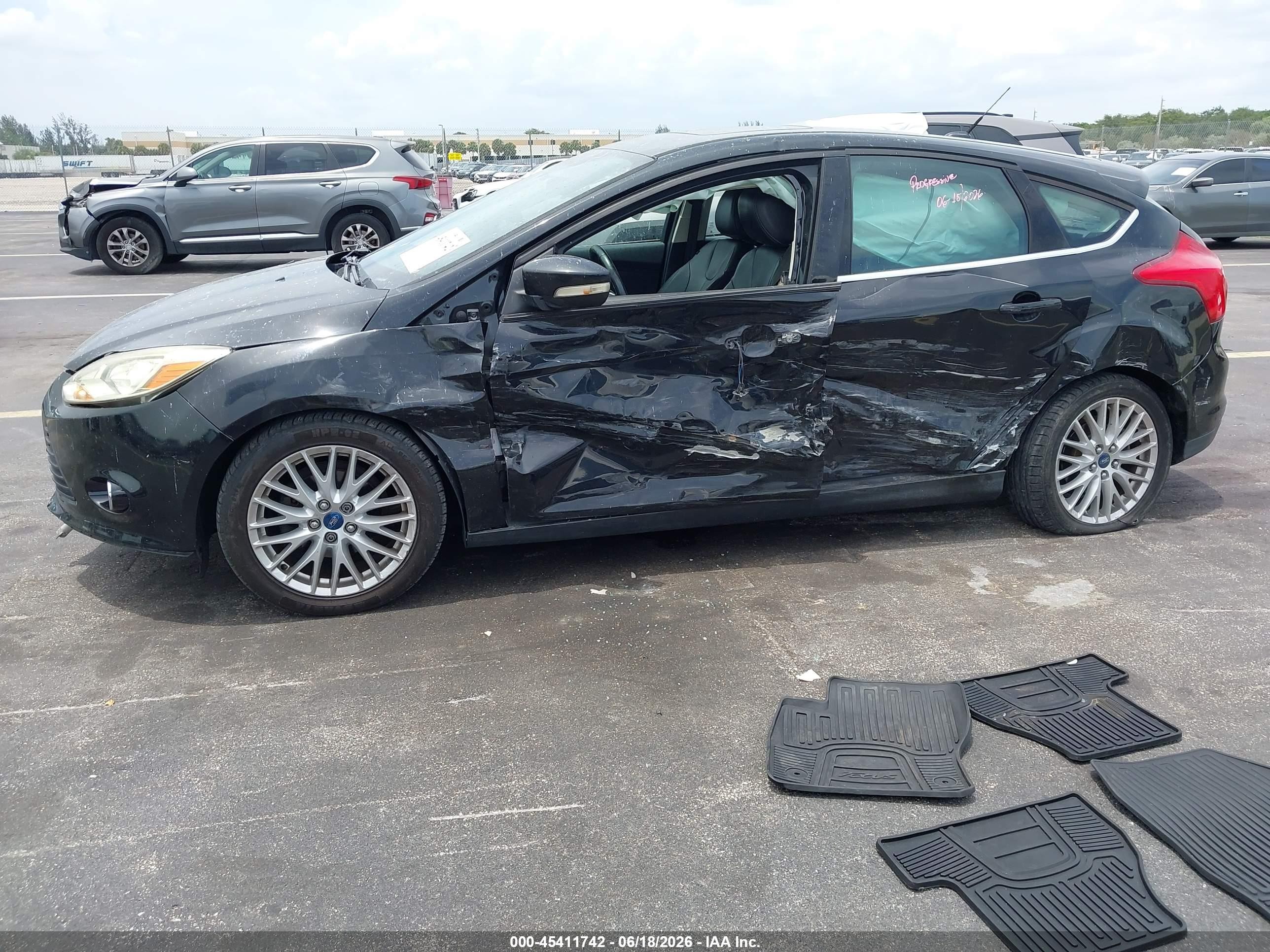 2013 Ford Focus Titanium Black vin: 1FADP3N25DL168963