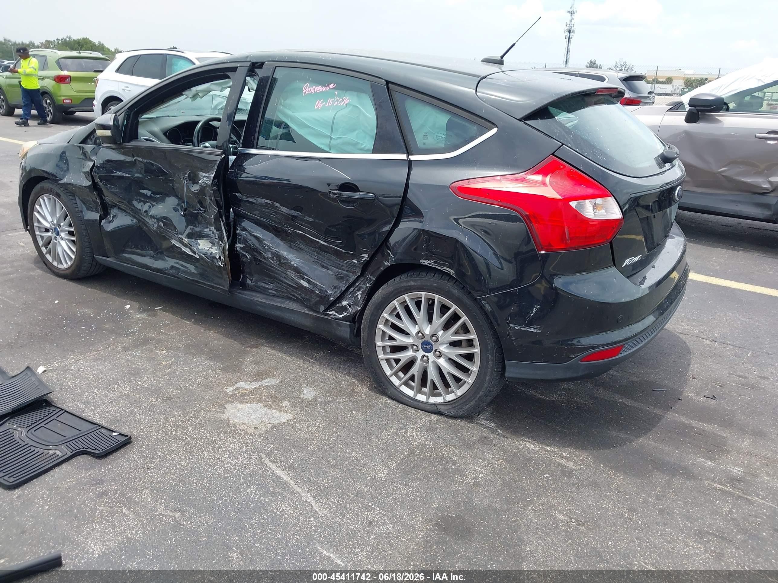 2013 Ford Focus Titanium Black vin: 1FADP3N25DL168963