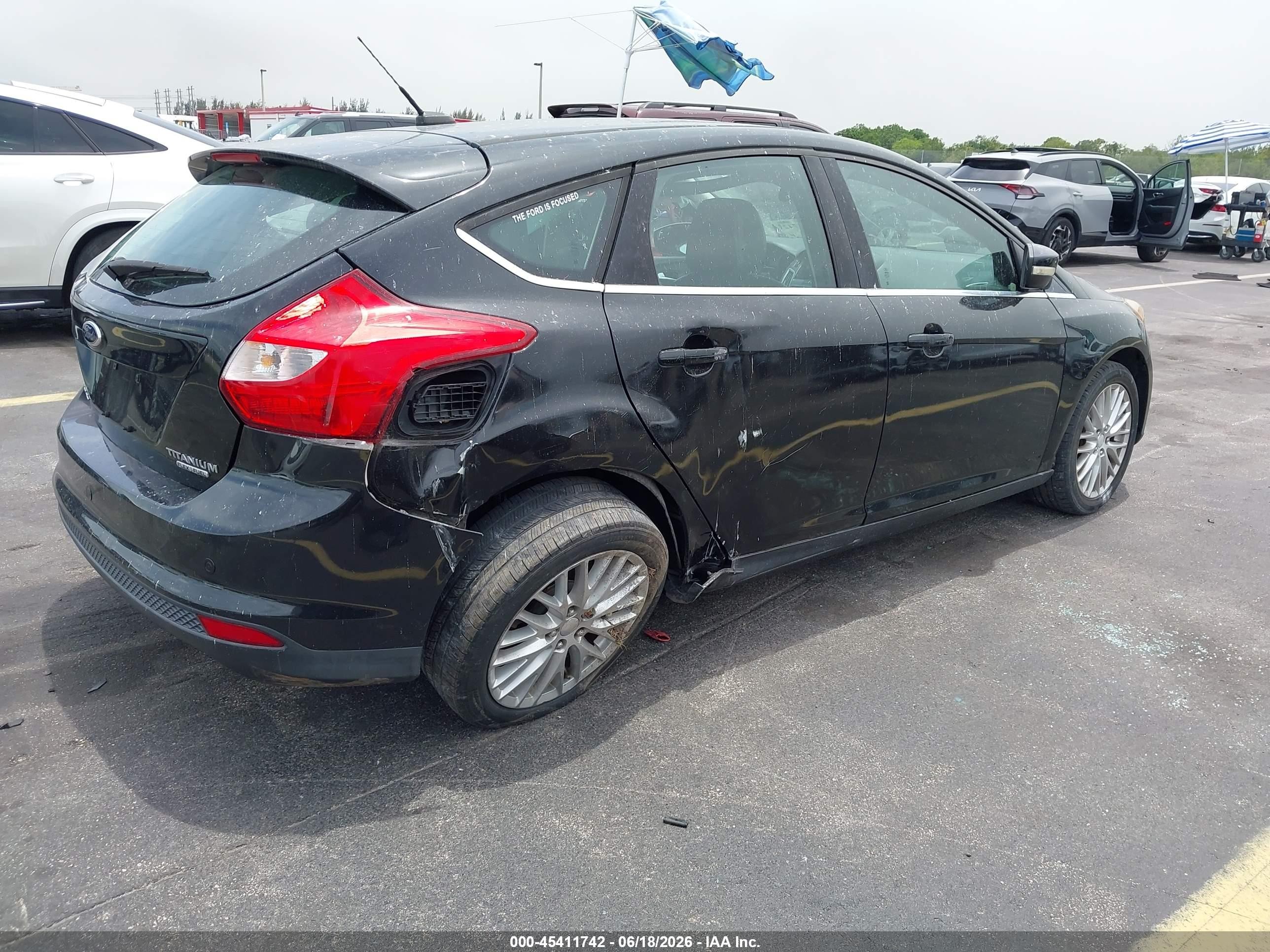 2013 Ford Focus Titanium Black vin: 1FADP3N25DL168963
