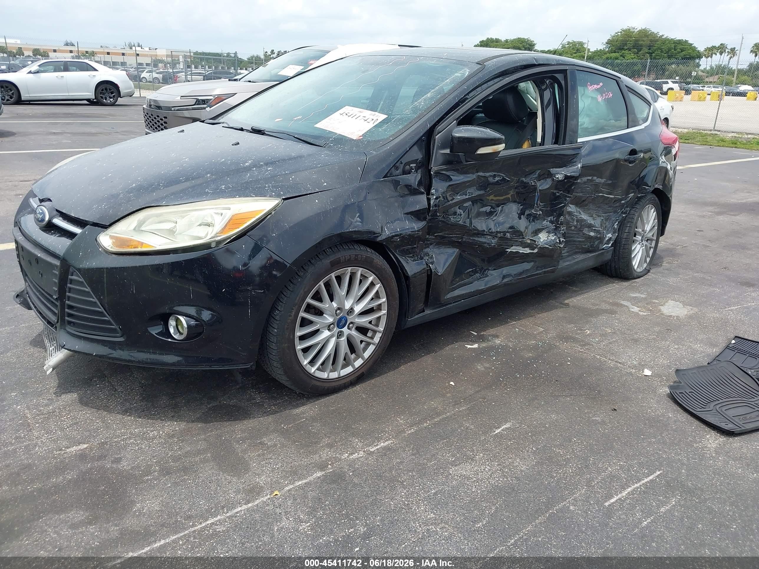 2013 Ford Focus Titanium Black vin: 1FADP3N25DL168963