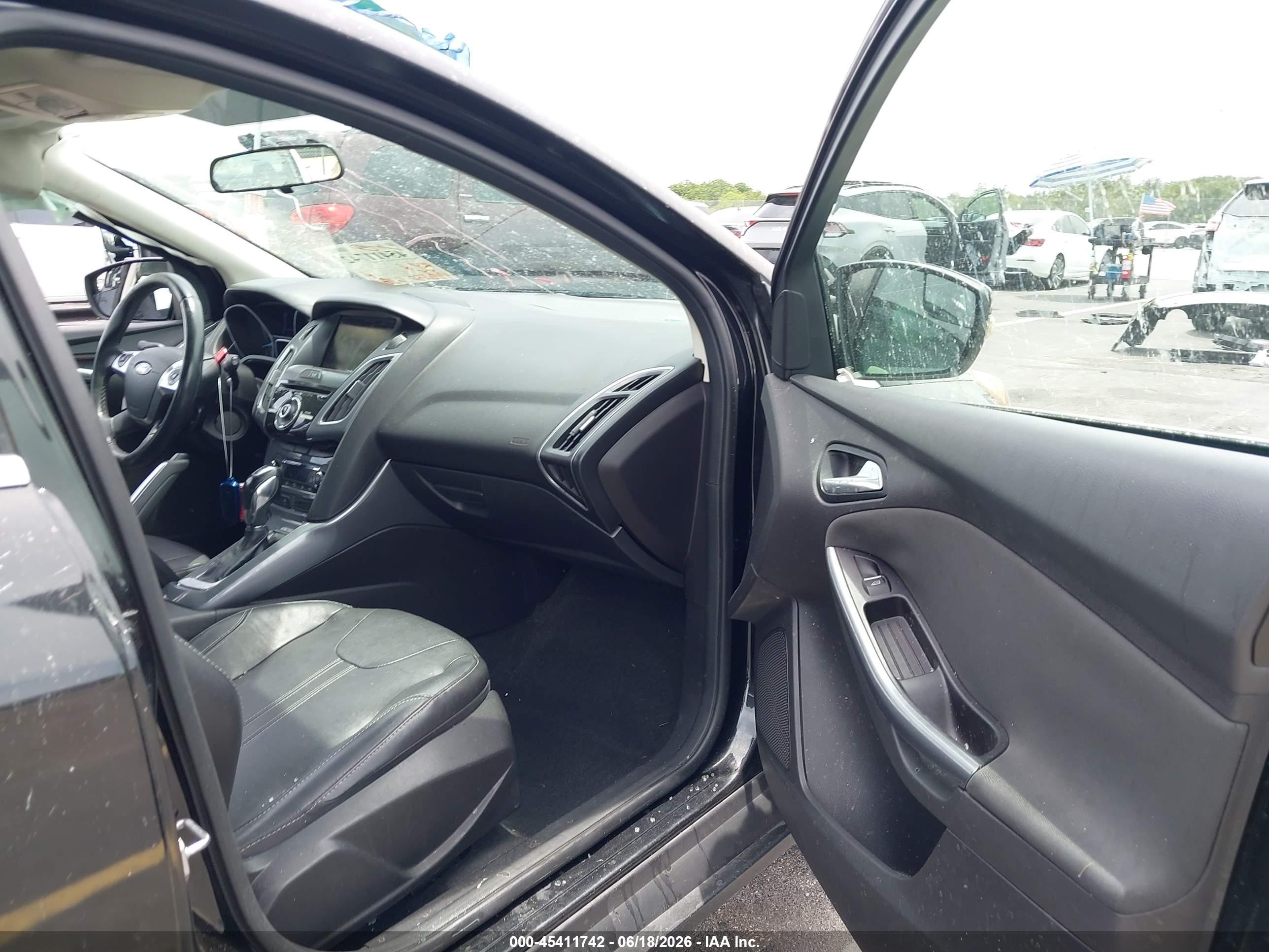 2013 Ford Focus Titanium Black vin: 1FADP3N25DL168963