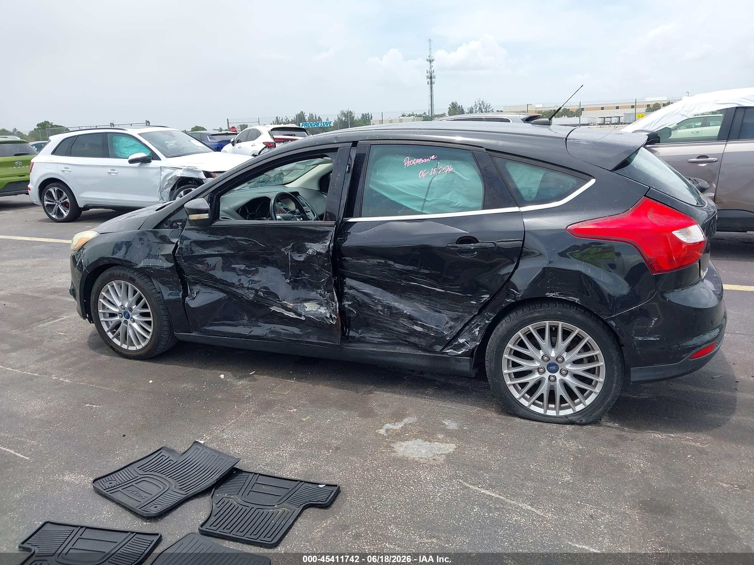 2013 Ford Focus Titanium Black vin: 1FADP3N25DL168963