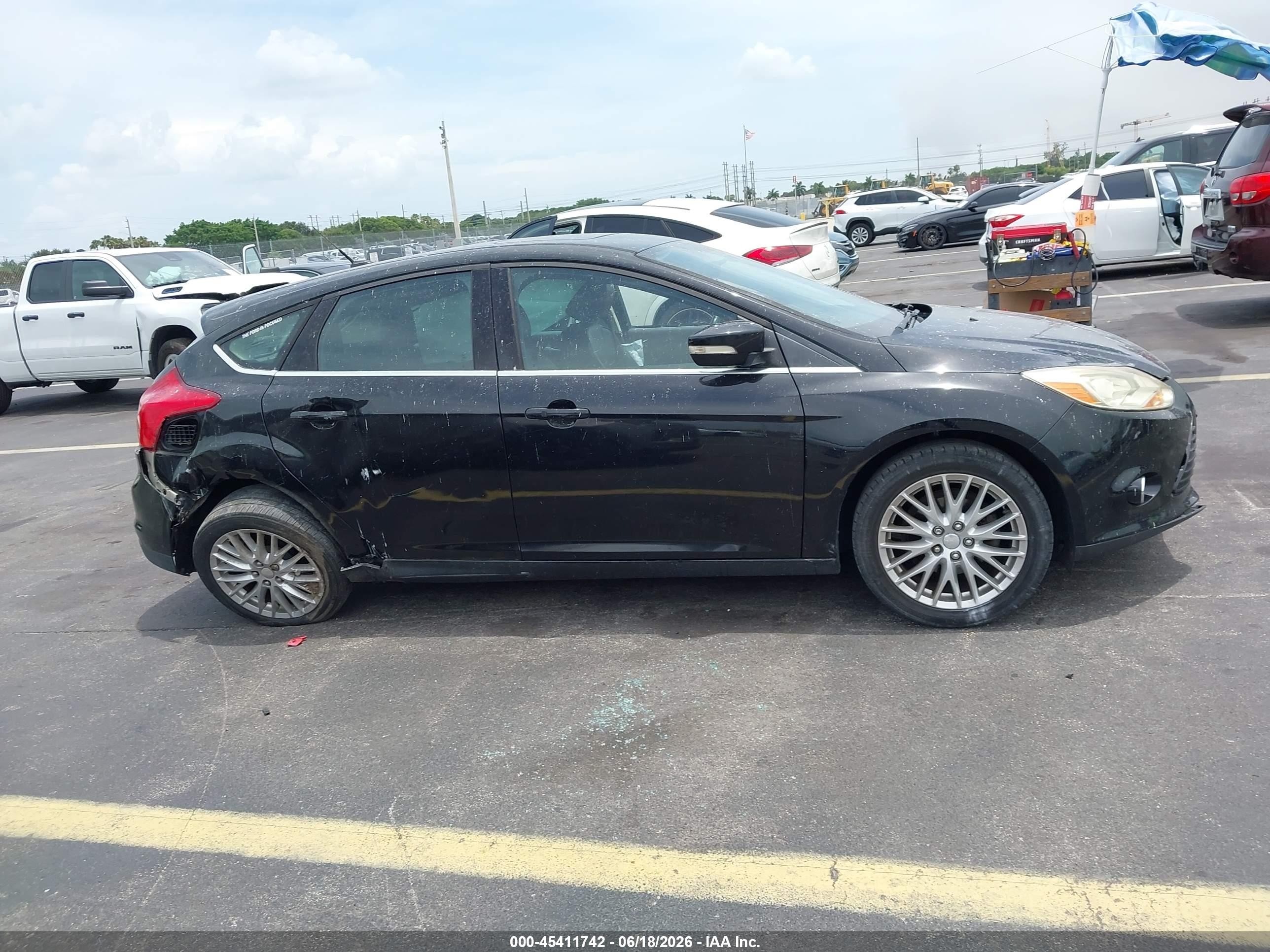 2013 Ford Focus Titanium Black vin: 1FADP3N25DL168963