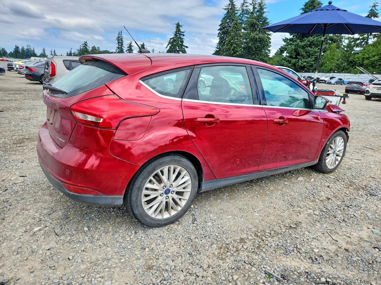 2015 Ford Focus Titanium Red vin: 1FADP3N25FL358796