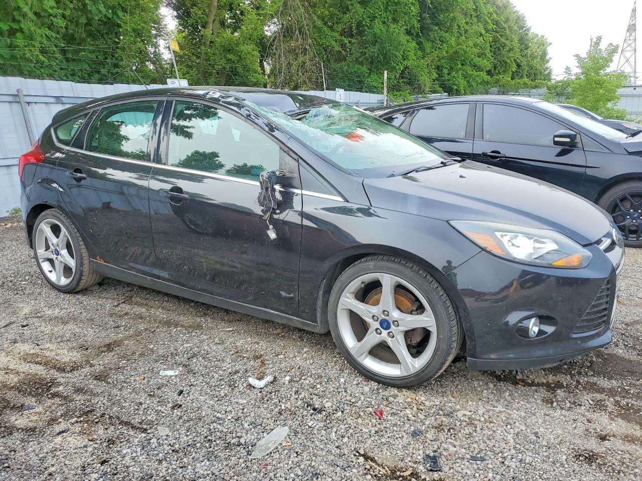 2013 Ford Focus Titanium Black vin: 1FADP3N26DL101661