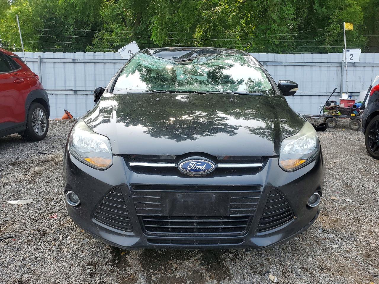 2013 Ford Focus Titanium Black vin: 1FADP3N26DL101661